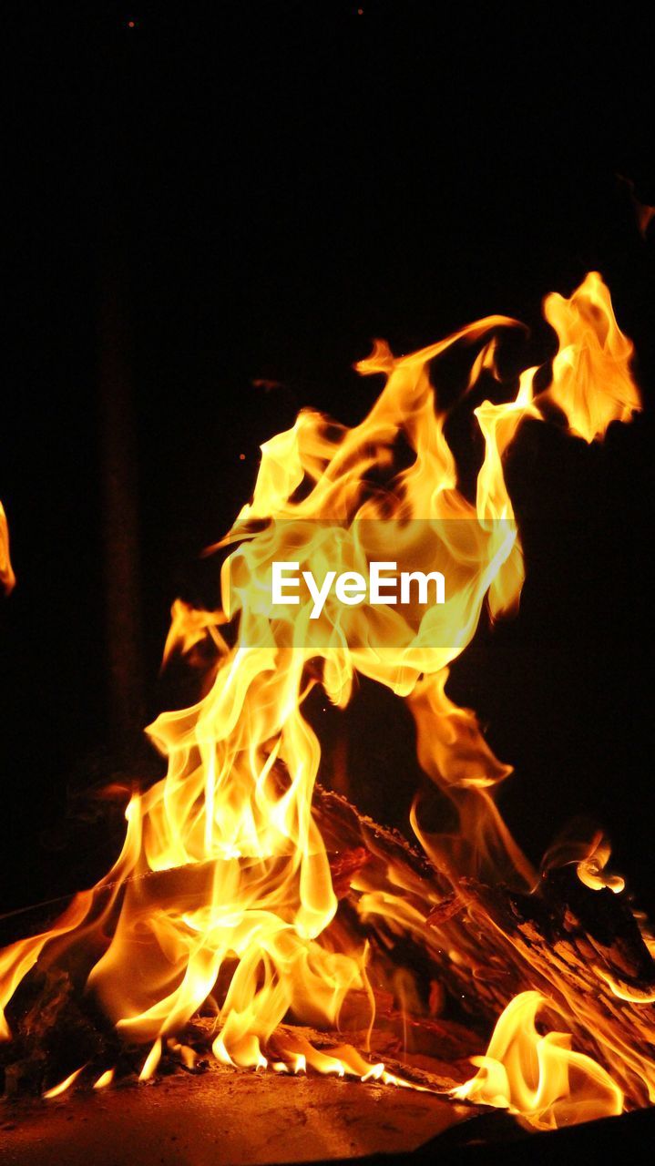 CLOSE-UP OF FIRE IN THE NIGHT