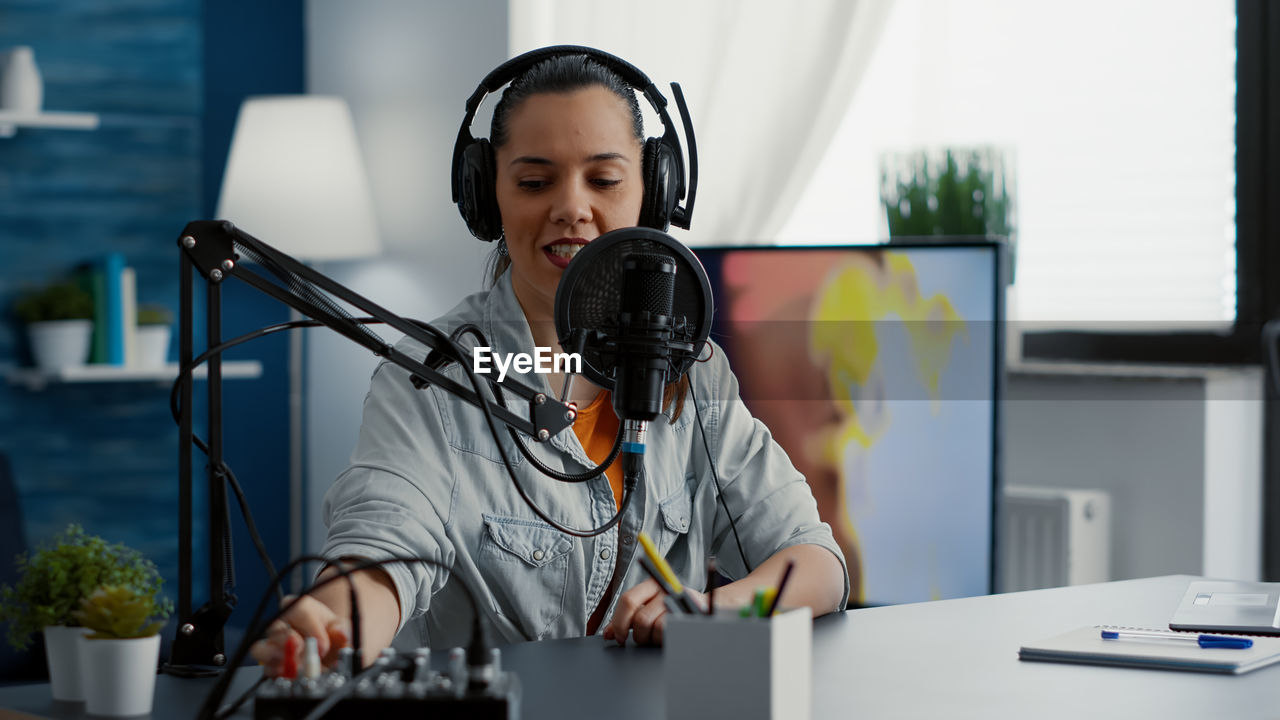 portrait of young woman working at office