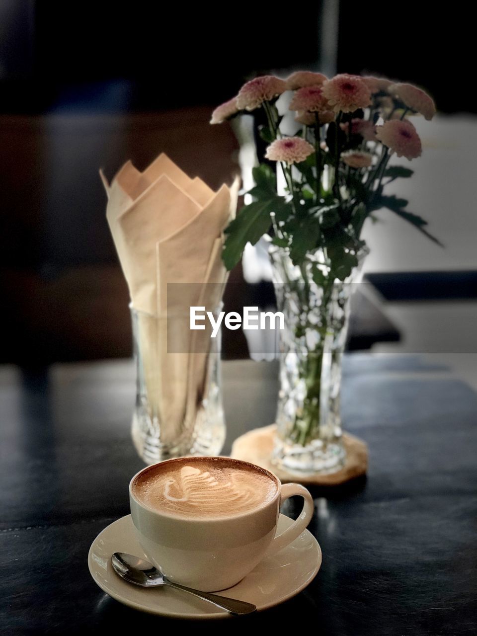 Close-up of coffee cup on table