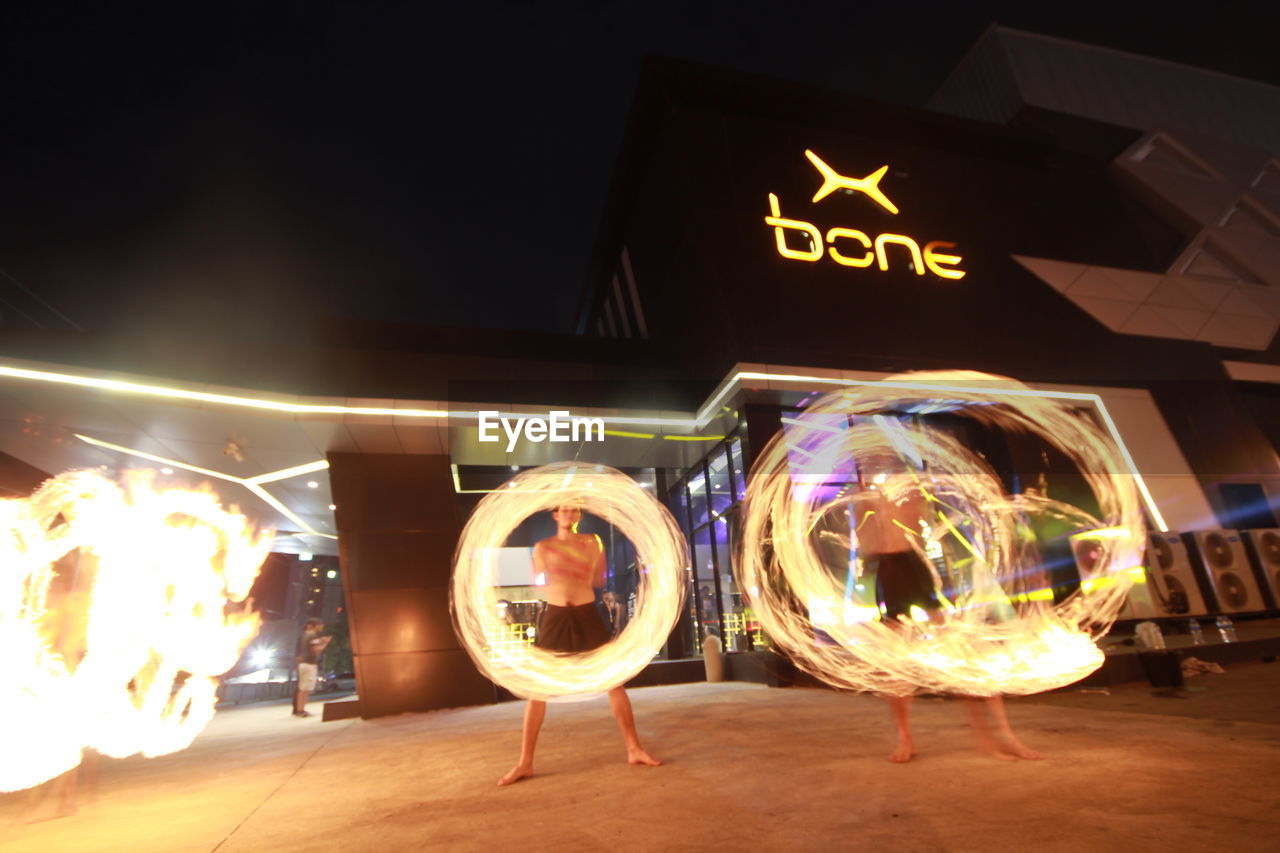 VIEW OF ILLUMINATED SIGN AT RESTAURANT