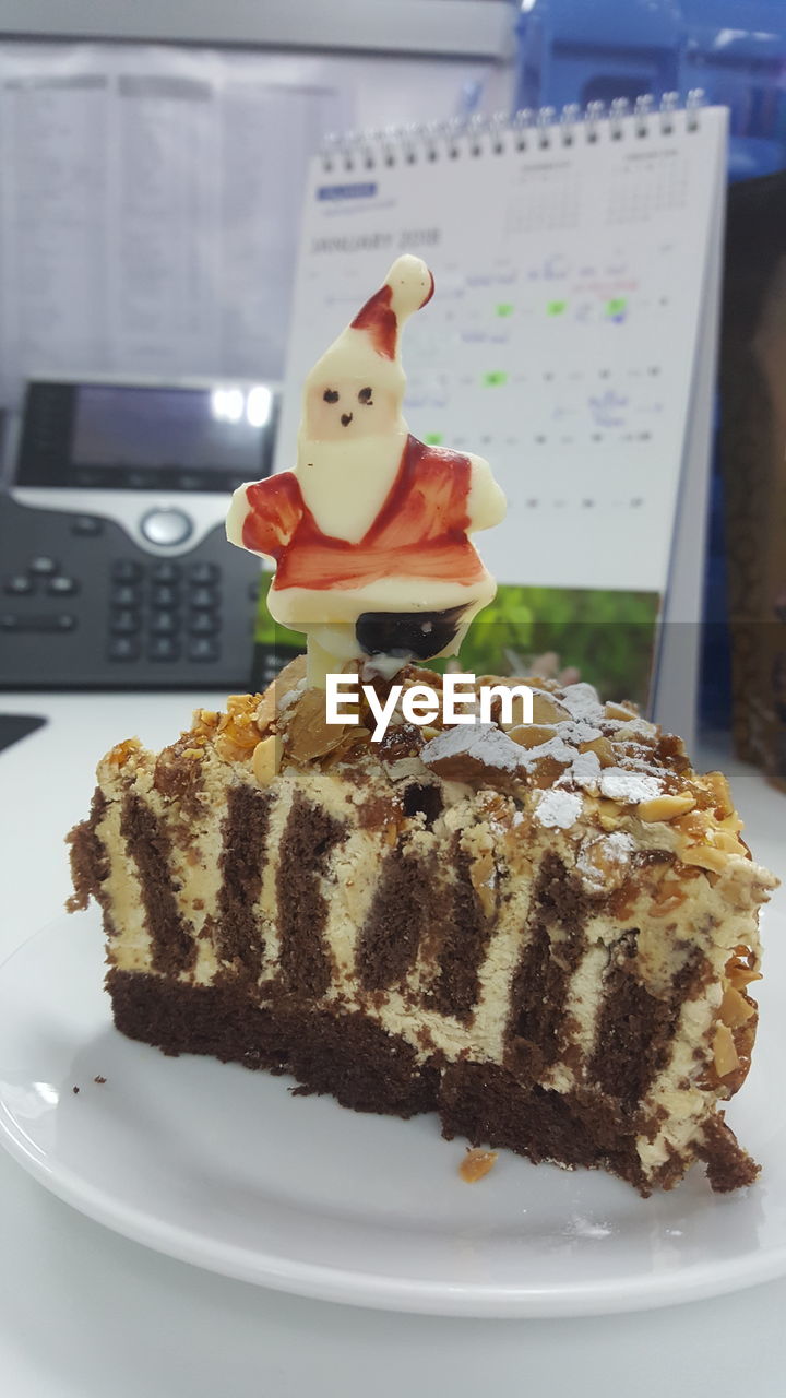 Cake in plate on table