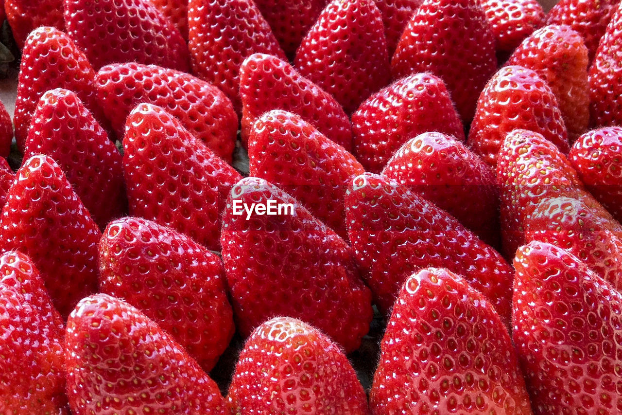 Full frame shot of red strawberries