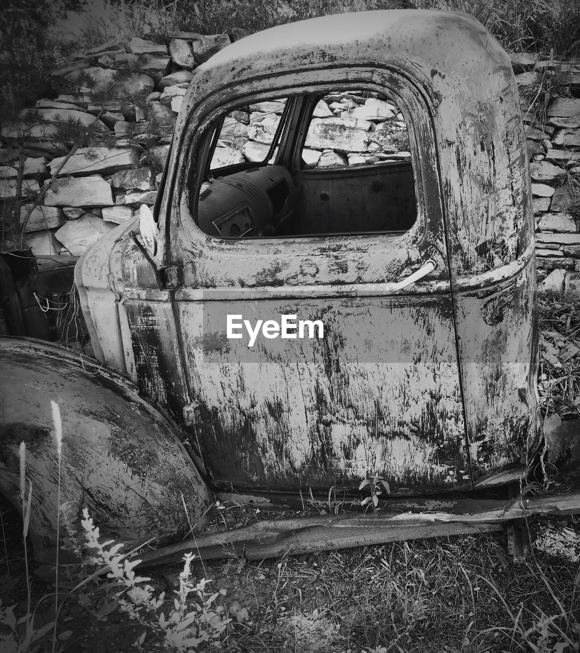 Close-up of abandoned car