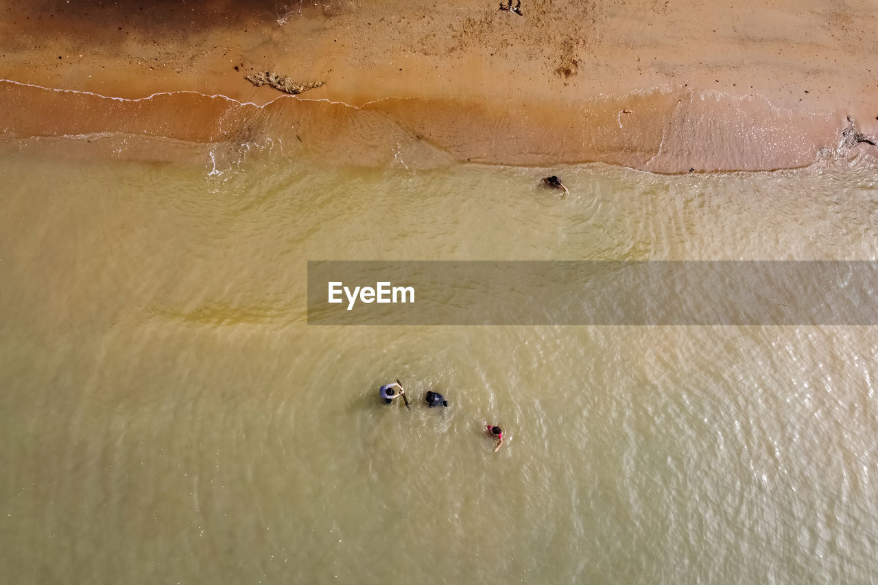 sand, land, water, nature, high angle view, beach, environment, scenics - nature, outdoors, day, travel, landscape, beauty in nature, sea, travel destinations, aerial view, tranquility, no people, non-urban scene, sunlight