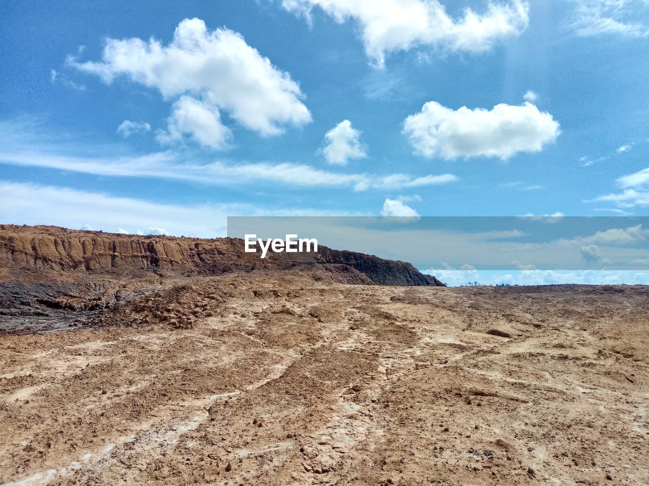 Scenic view of desert against sky