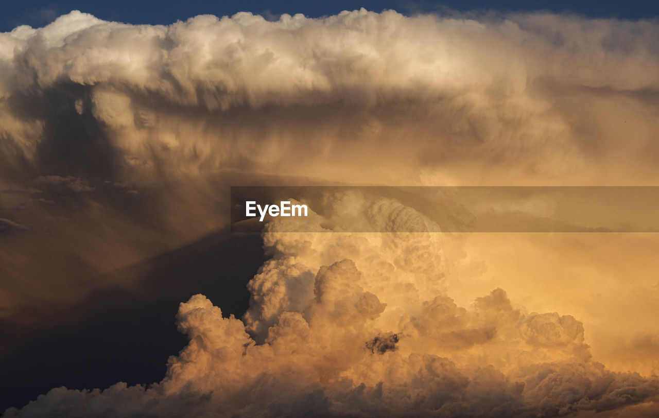 Low angle view of clouds in sky during sunset