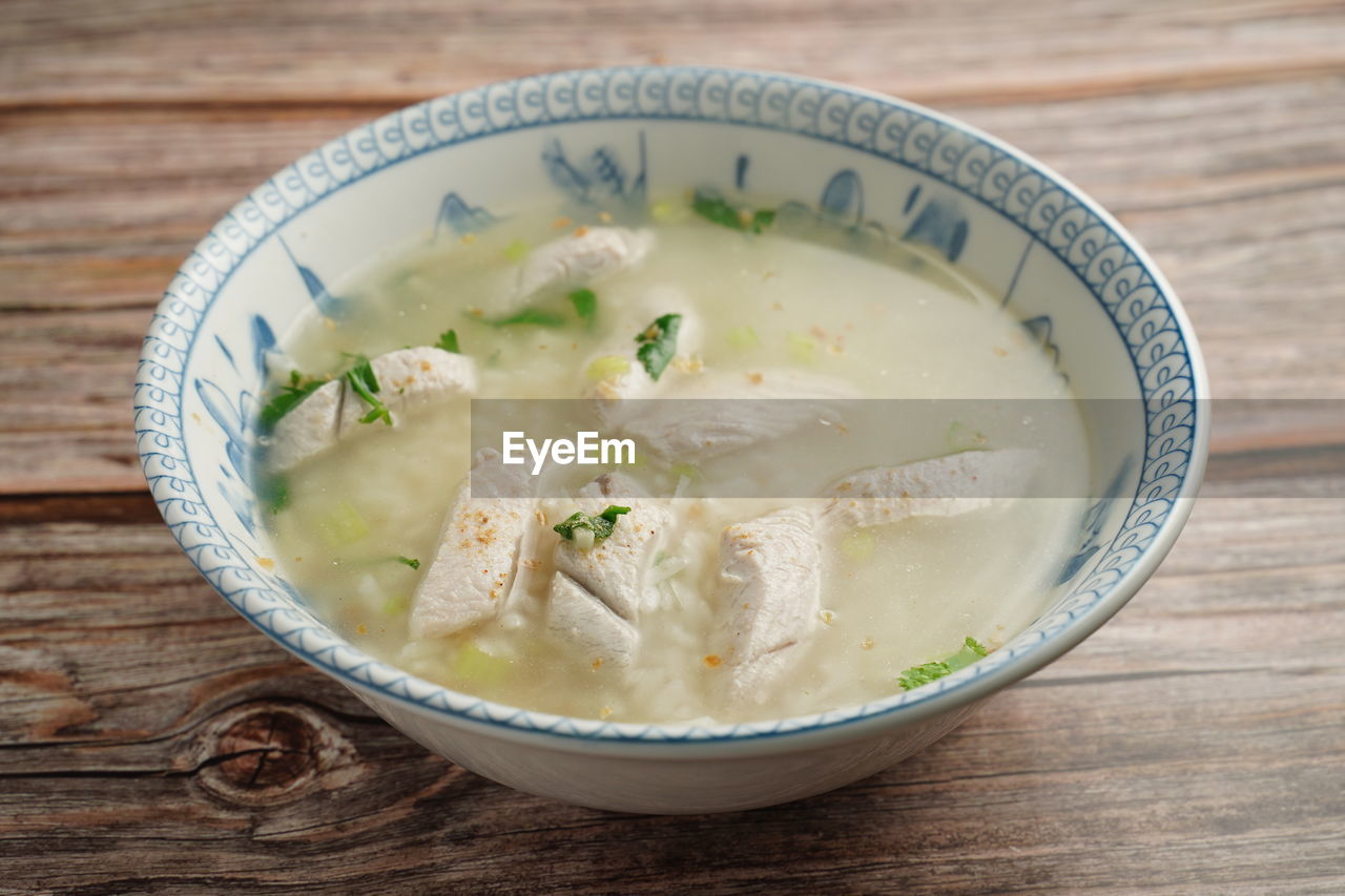 food and drink, food, healthy eating, wellbeing, dish, bowl, soup, clam chowder, wood, vegetable, freshness, no people, produce, indoors, table, studio shot, herb, garnish, dairy, close-up, asian food, high angle view, cuisine, meal