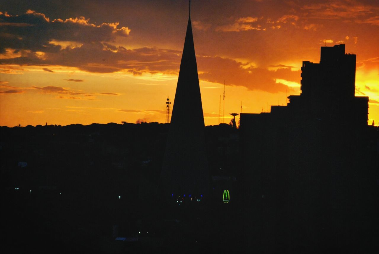 SILHOUETTE OF BUILDINGS AT NIGHT