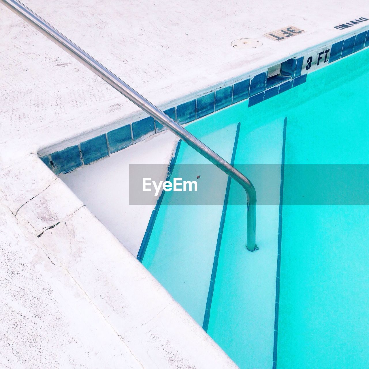Metal railing in swimming pool