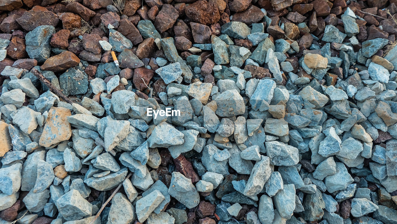 High angle view of stones on rock