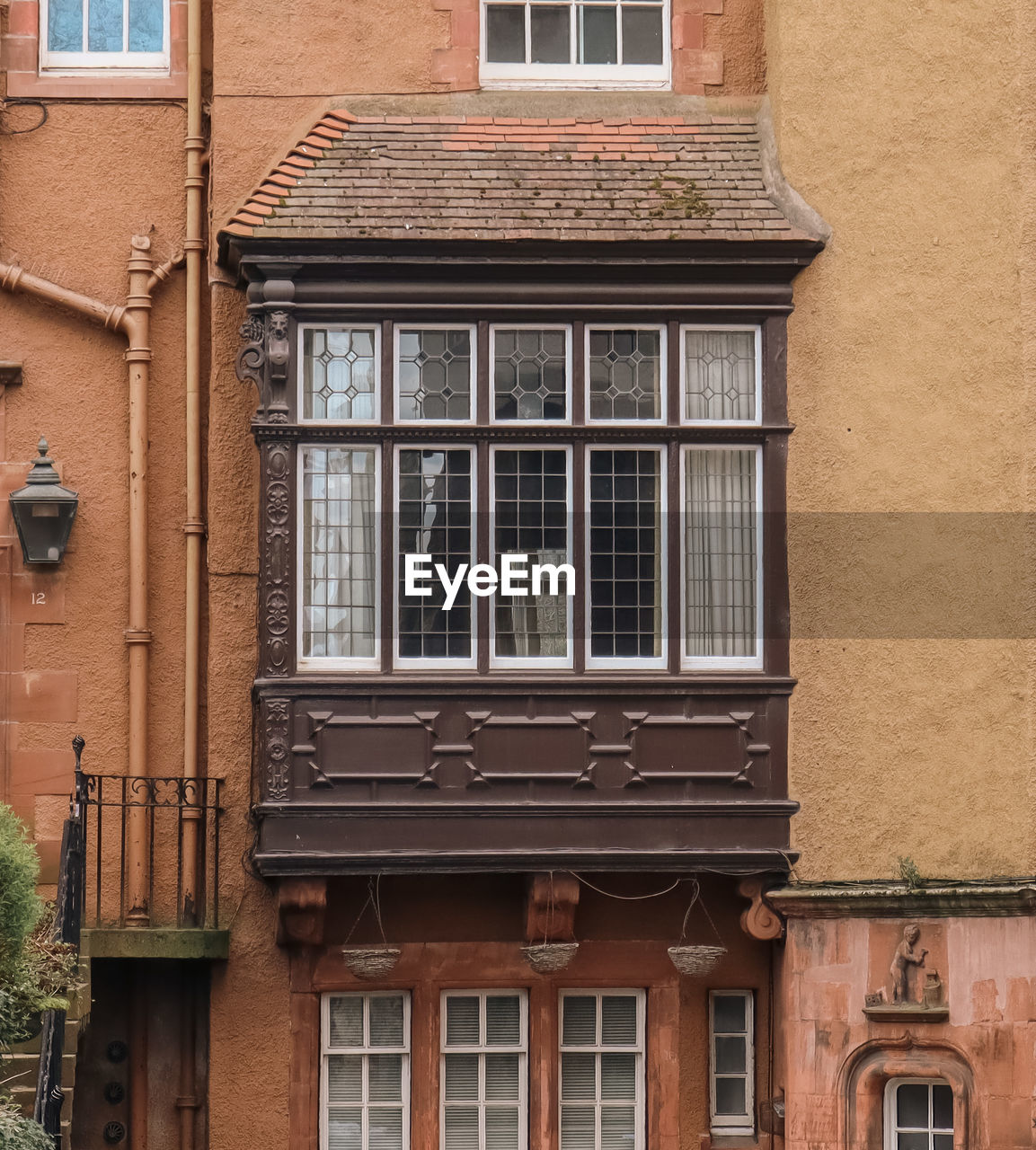 Low angle view of old building near edinburgh castle, ramsay garden, edinburgh, scotland, uk