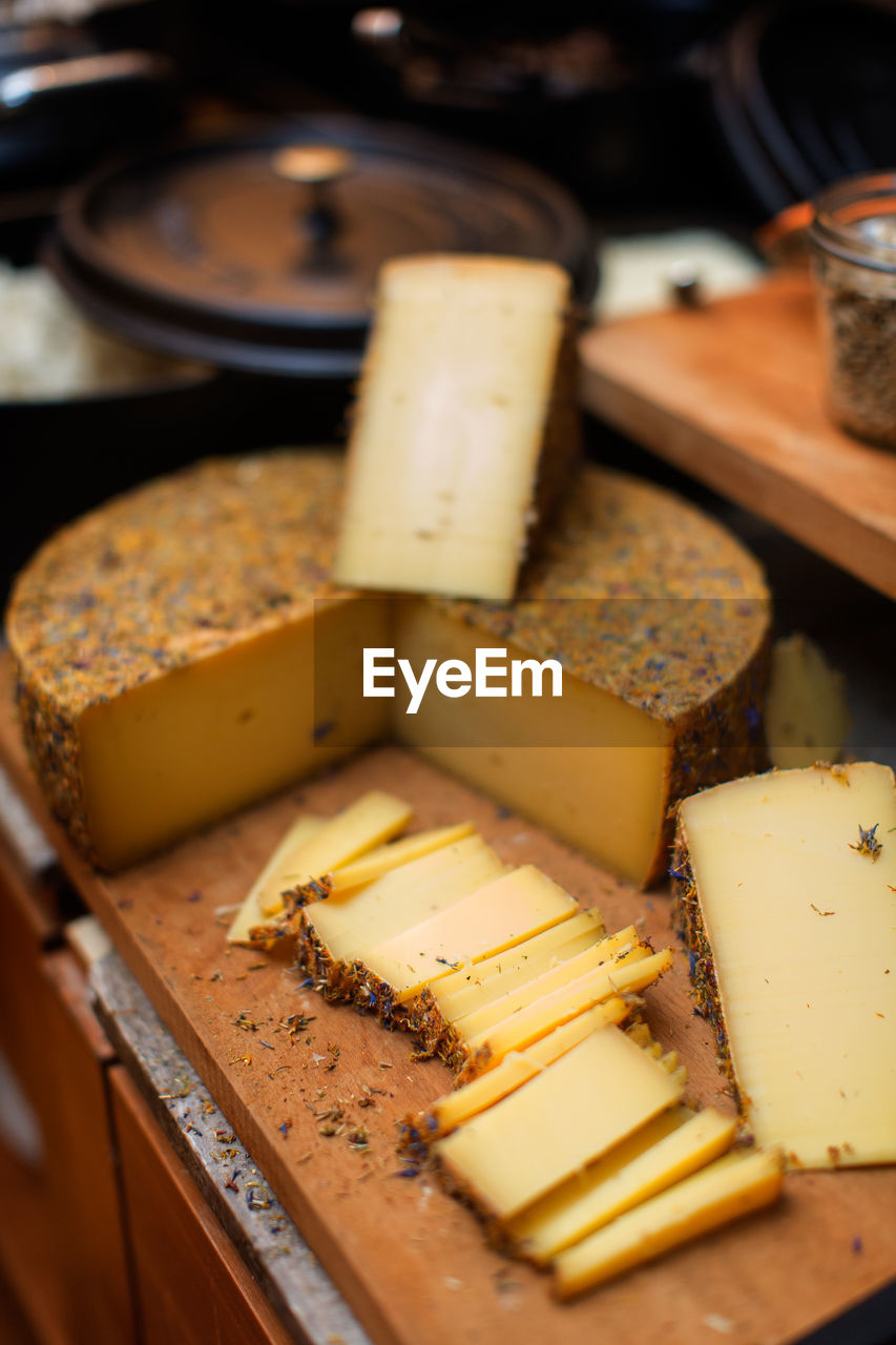 High angle view of cheese on cutting board