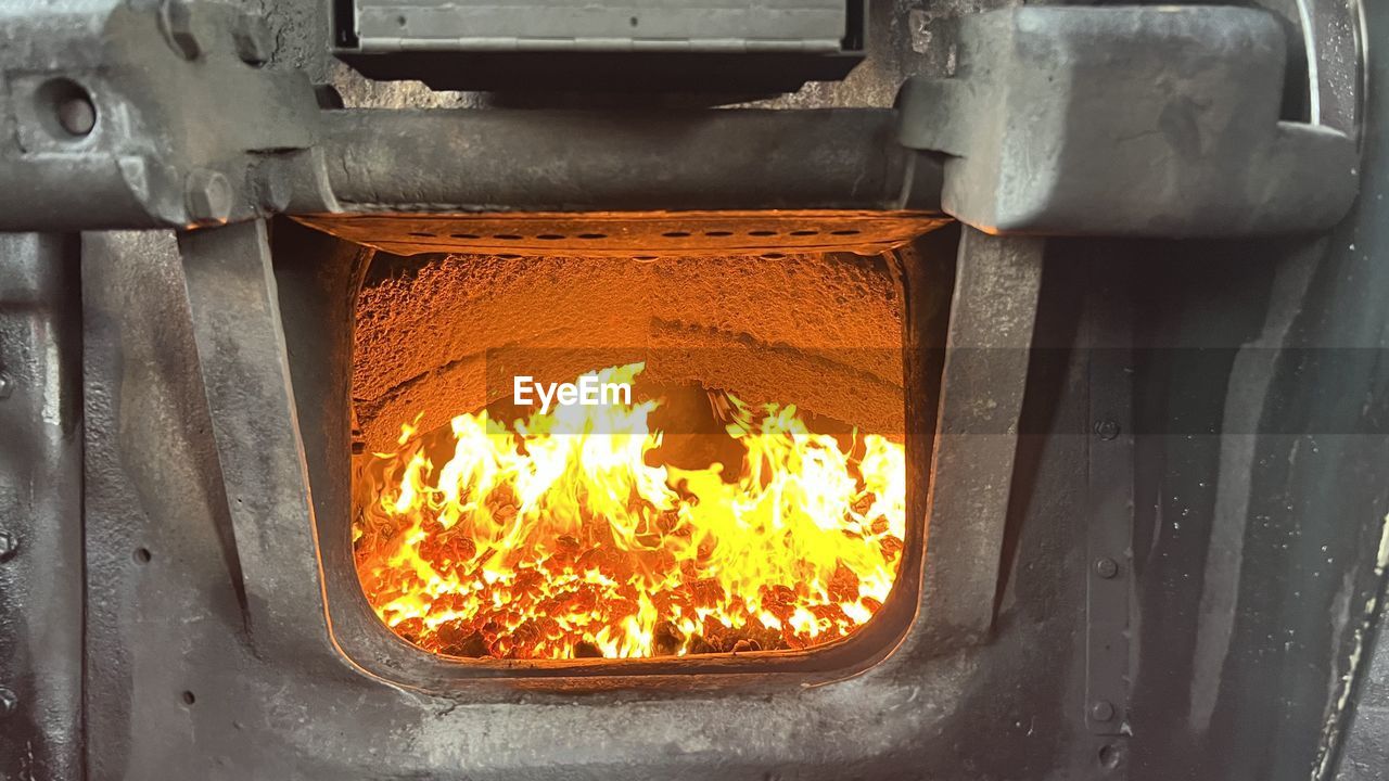 heat, metal, fire, burning, orange color, industry, no people, flame, close-up, foundry, iron, glowing, metal industry, bumper, wood-burning stove, forge, nature, steel, alloy, factory, indoors, yellow