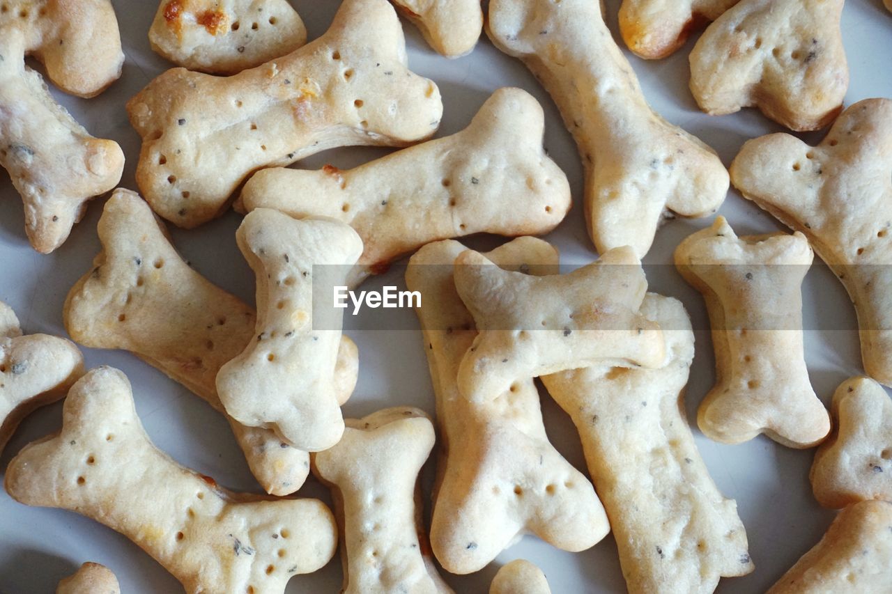 Full frame shot of dog biscuits on table