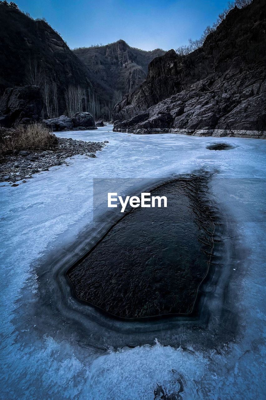 Ice river winter valley