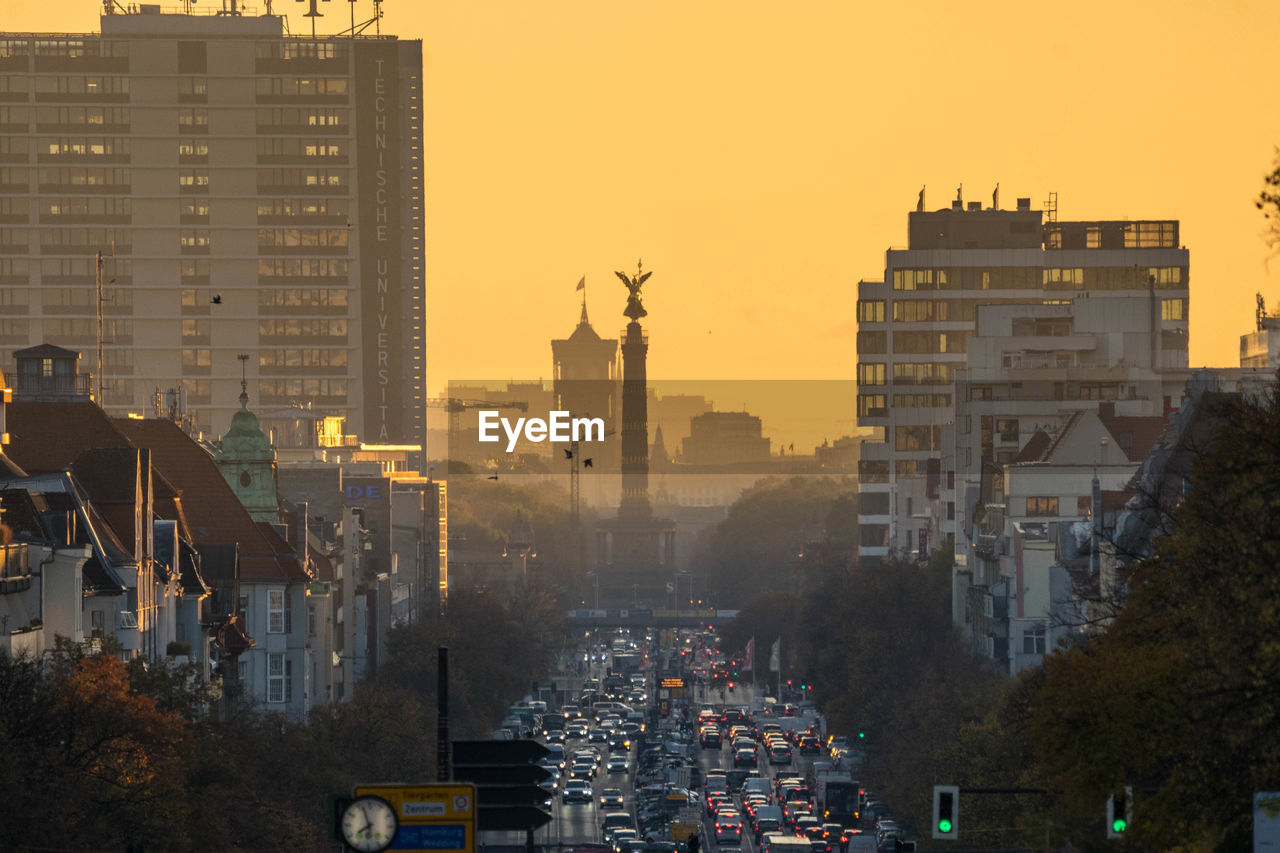 Berlin cityscape sunset - tv tower, red townhall, brandenburg gate and victory collumn