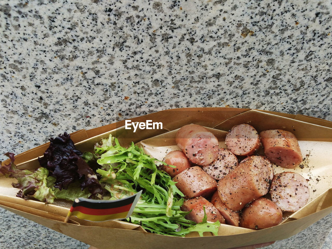 High angle view of cooked meat in paper bag