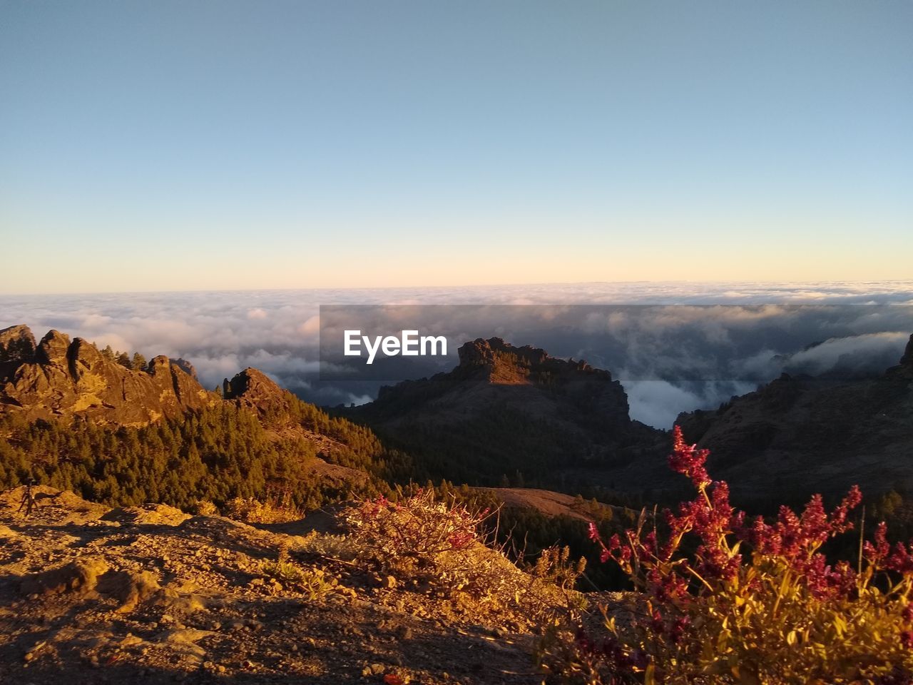 Scenic view of mountains against sky during sunset