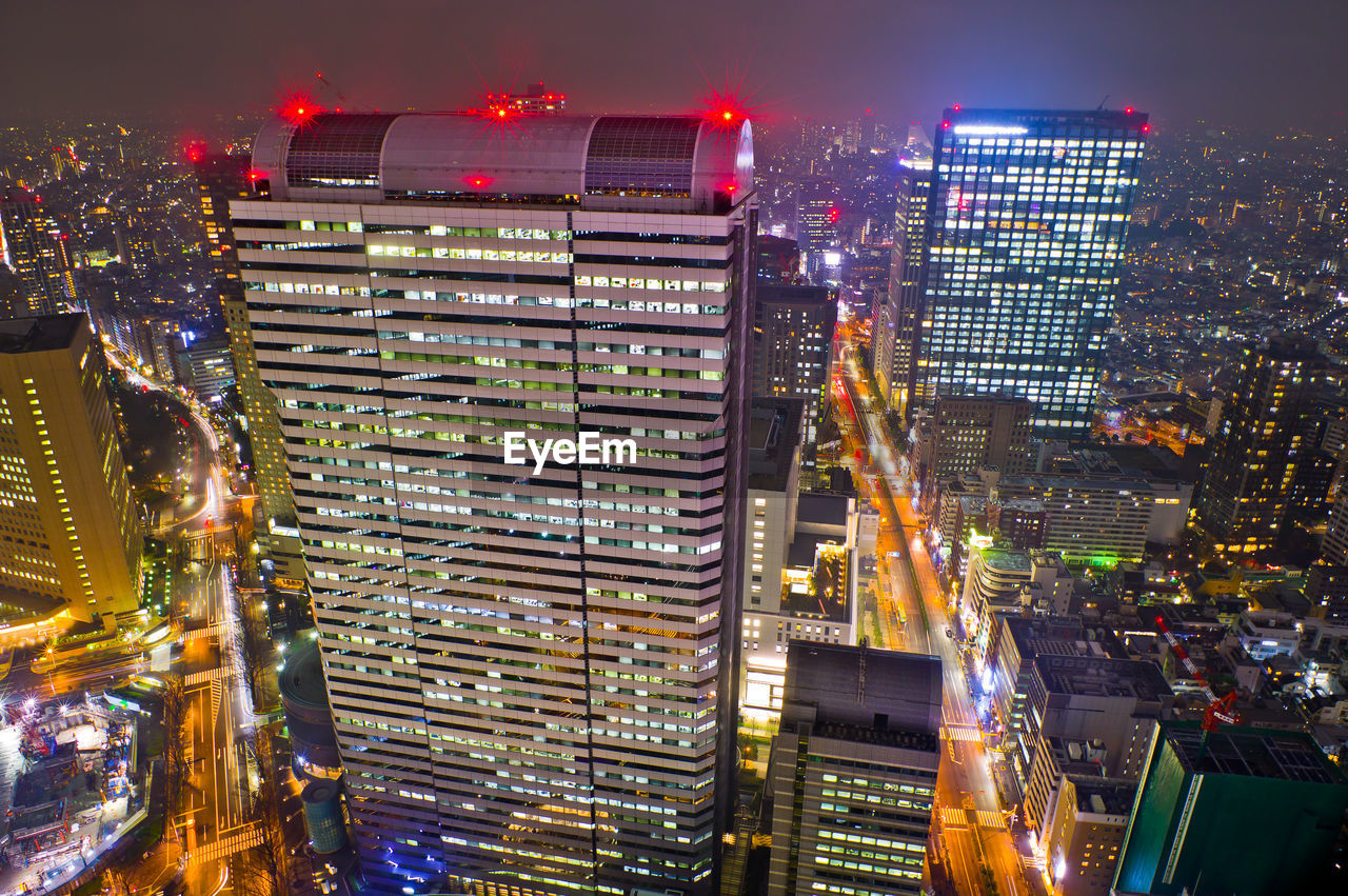 High angle view of illuminated buildings at night