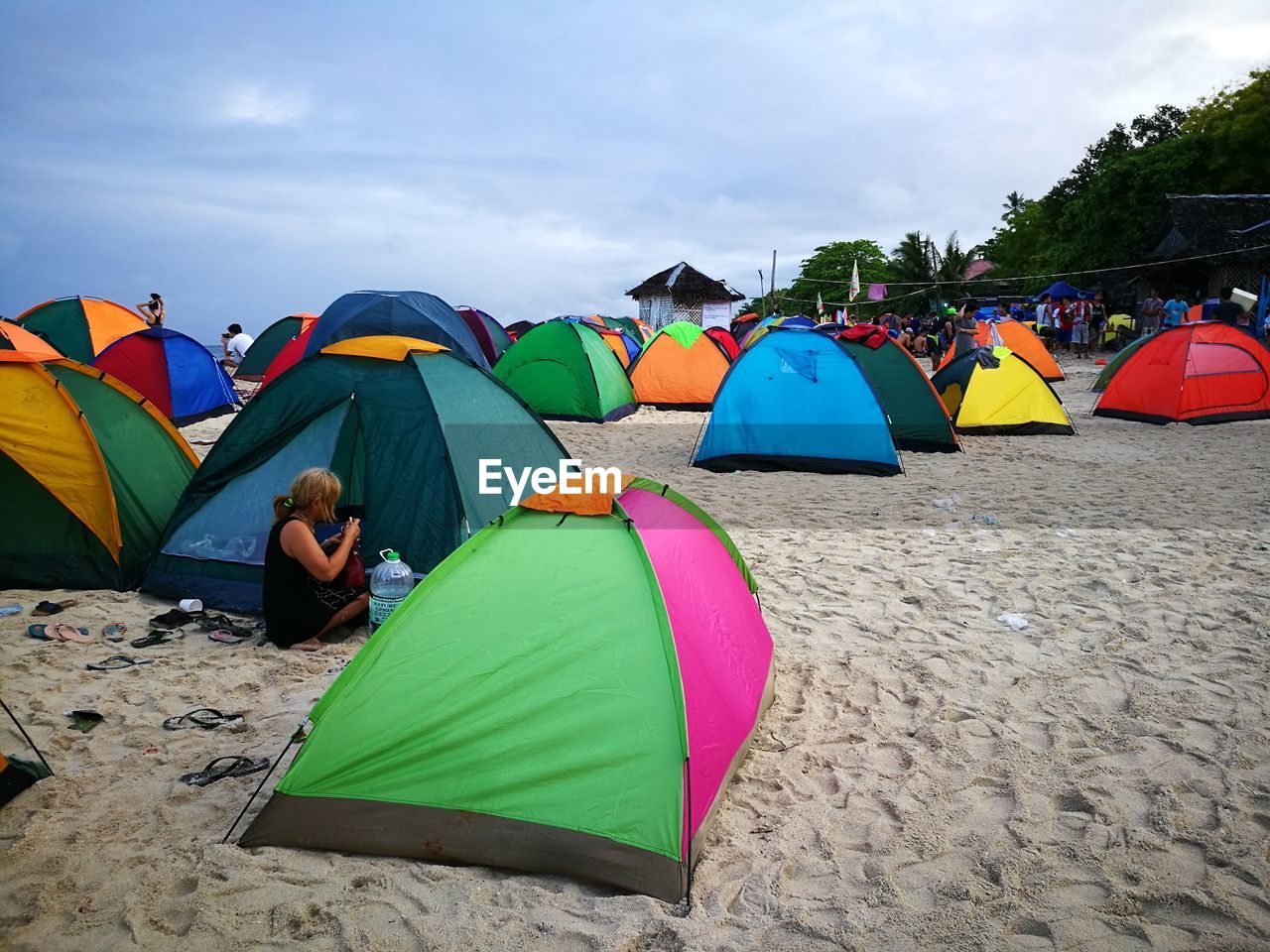 MULTI COLORED UMBRELLAS ON BEACH