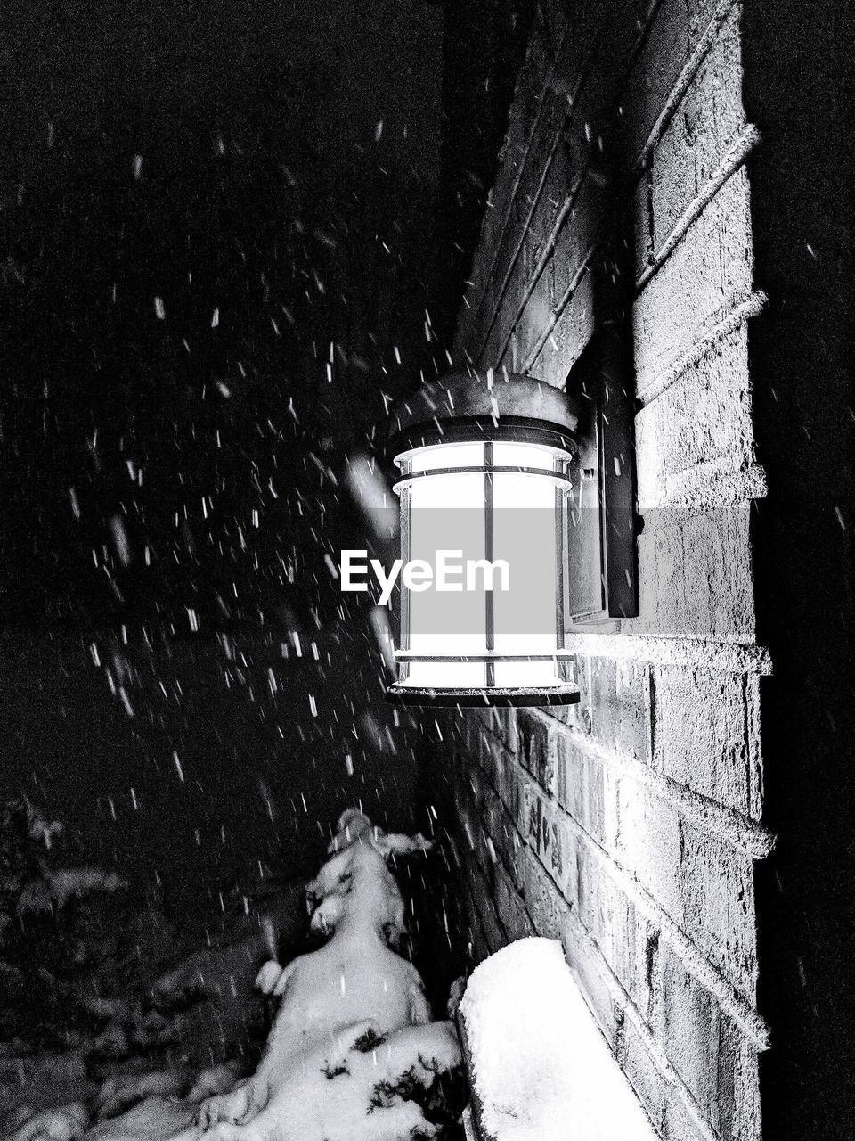 MAN ON WINDOW IN SNOW