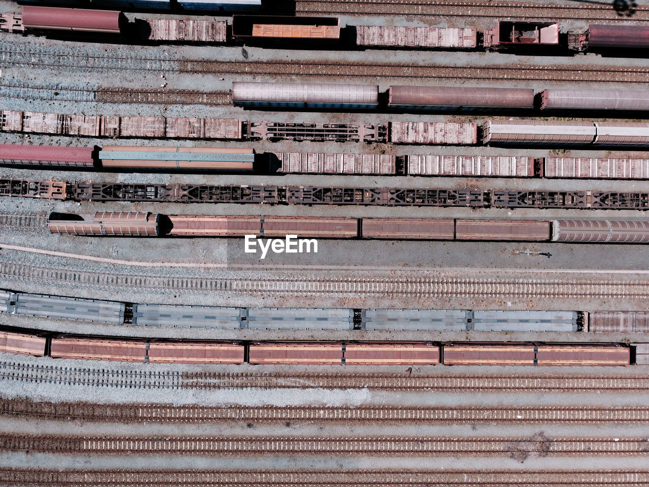 Aerial view from flying drone of trains on the railway station
