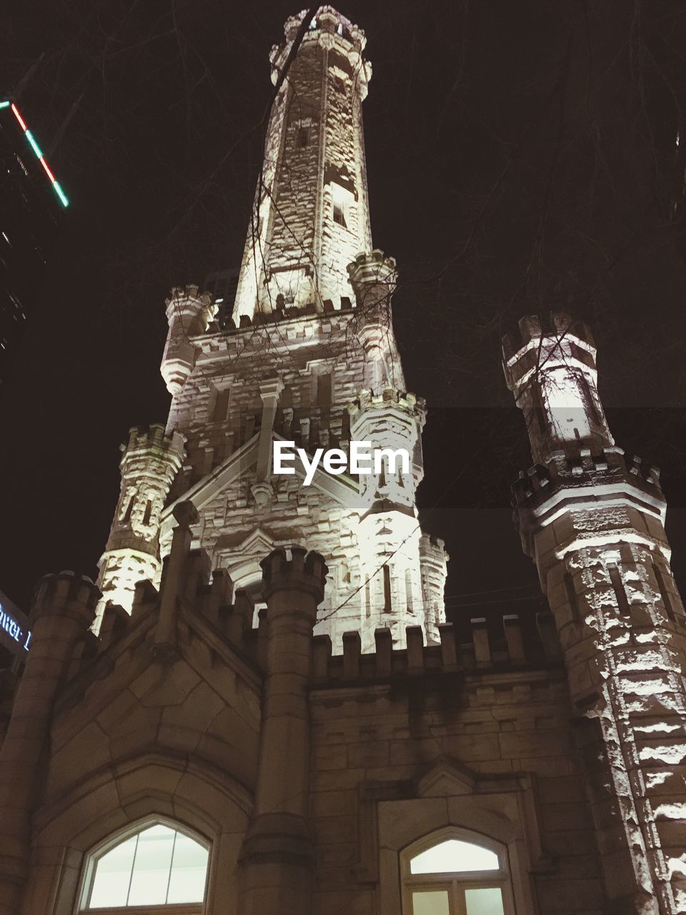 LOW ANGLE VIEW OF ILLUMINATED FERRIS WHEEL