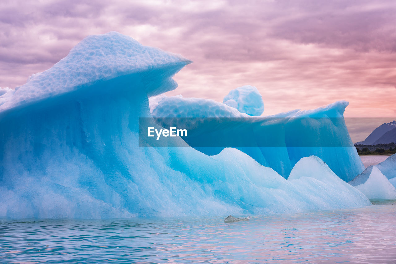 Scenic view of frozen lake against sky