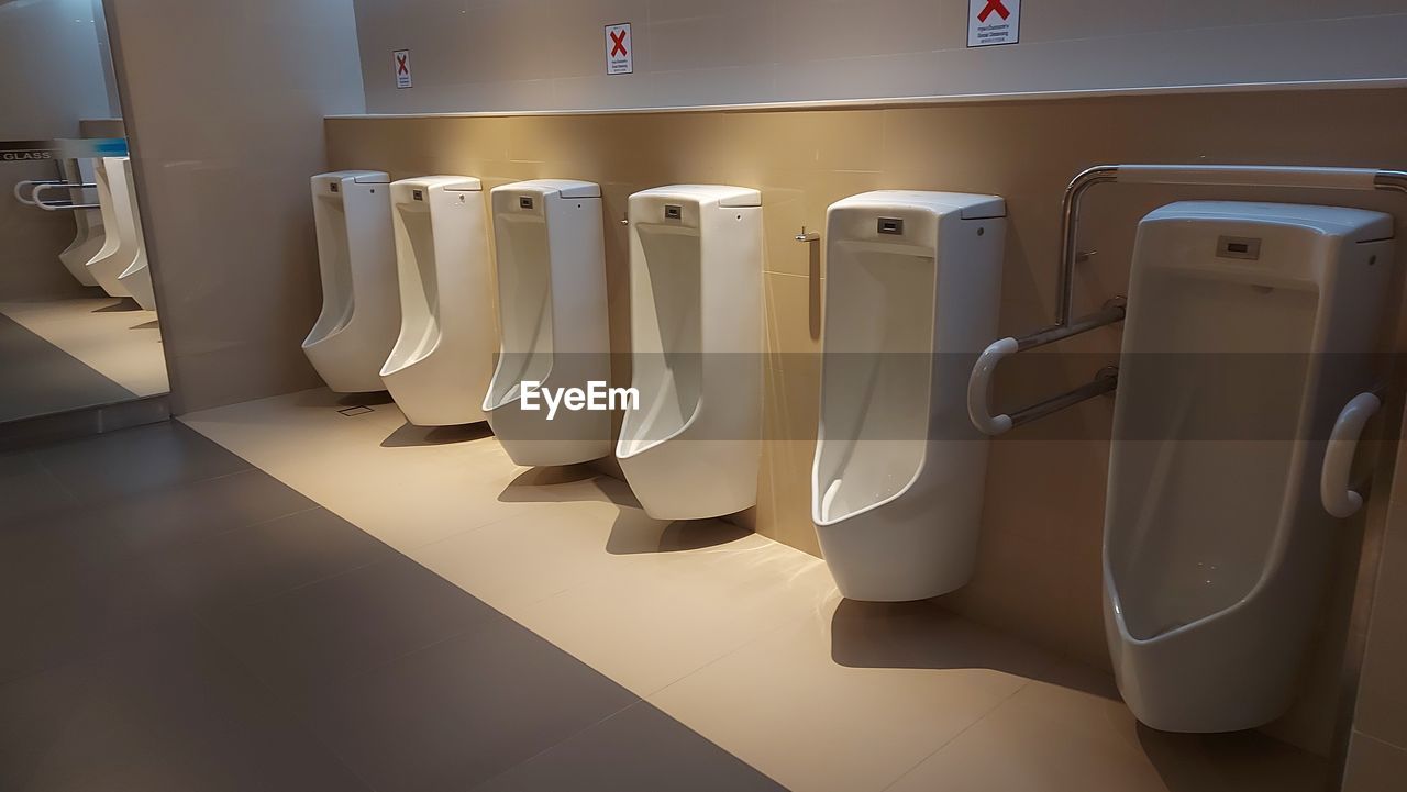 room, urinal, indoors, in a row, no people, bathroom, interior design, plumbing fixture, public building, toilet
