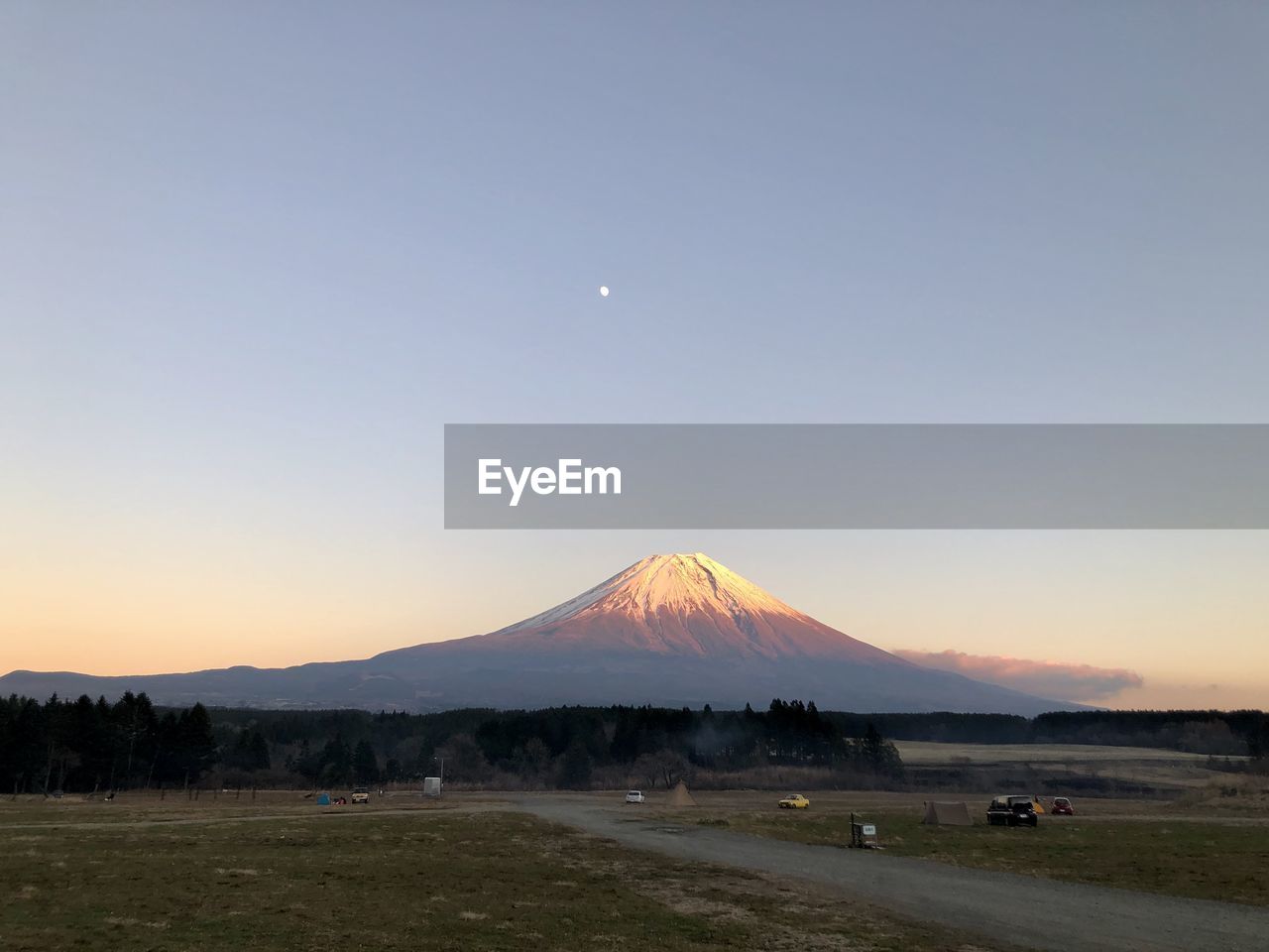 Scenic view of landscape against sky during sunset