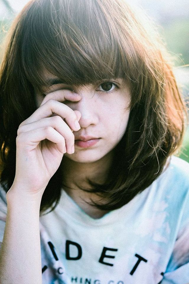 CLOSE-UP PORTRAIT OF A WOMAN WITH HAIR