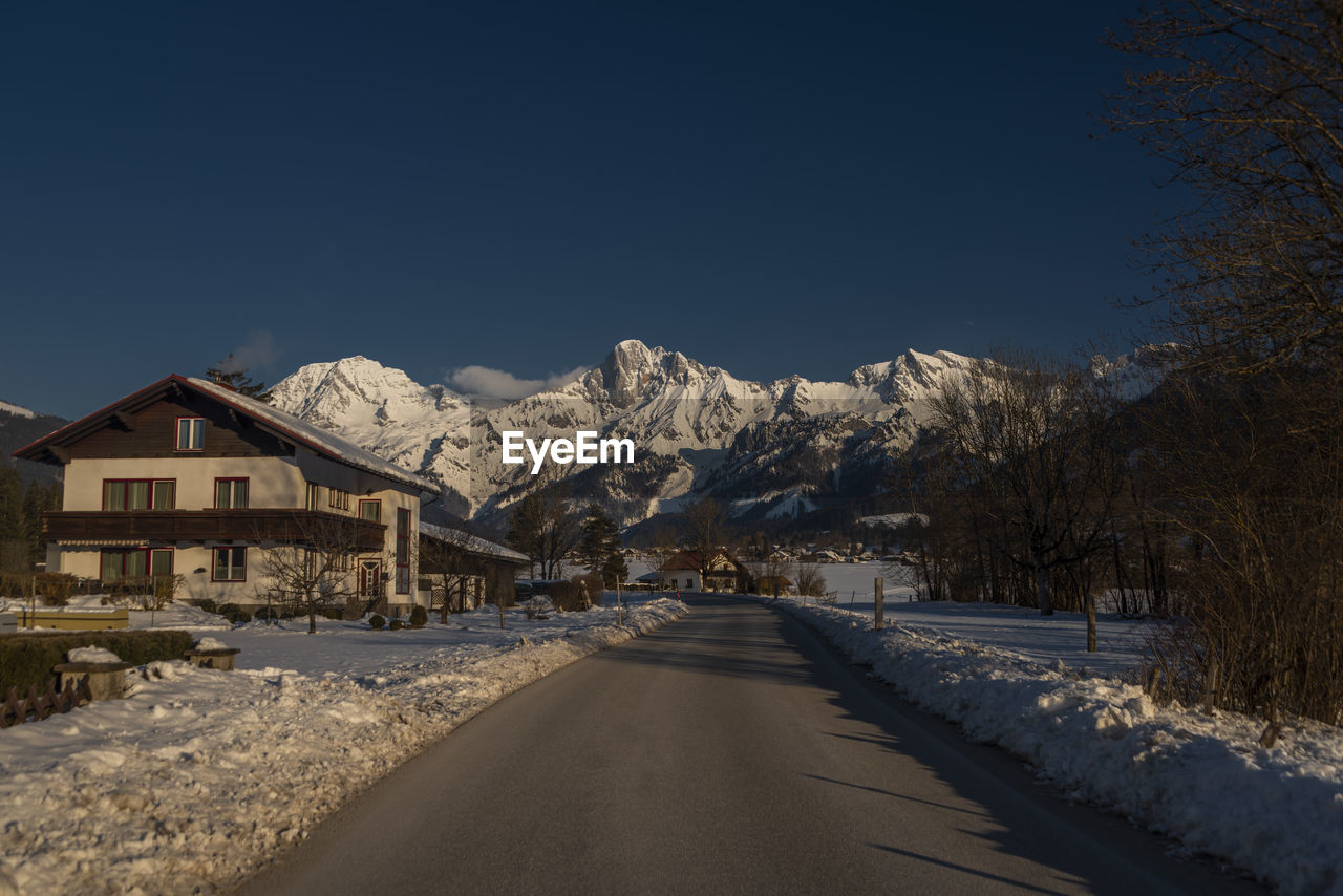 scenic view of snow covered mountains against clear sky