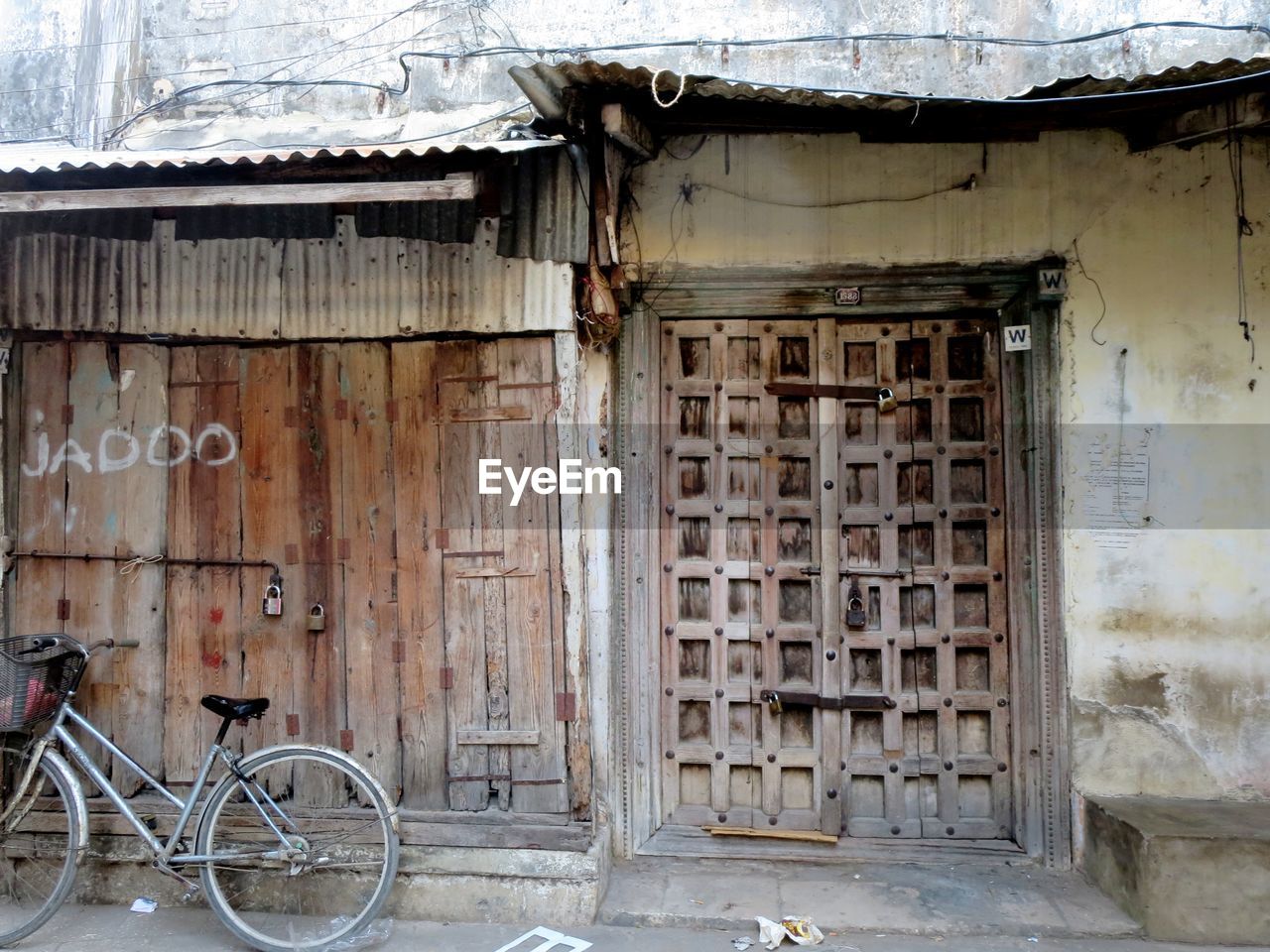 BICYCLE PARKED ON WINDOW