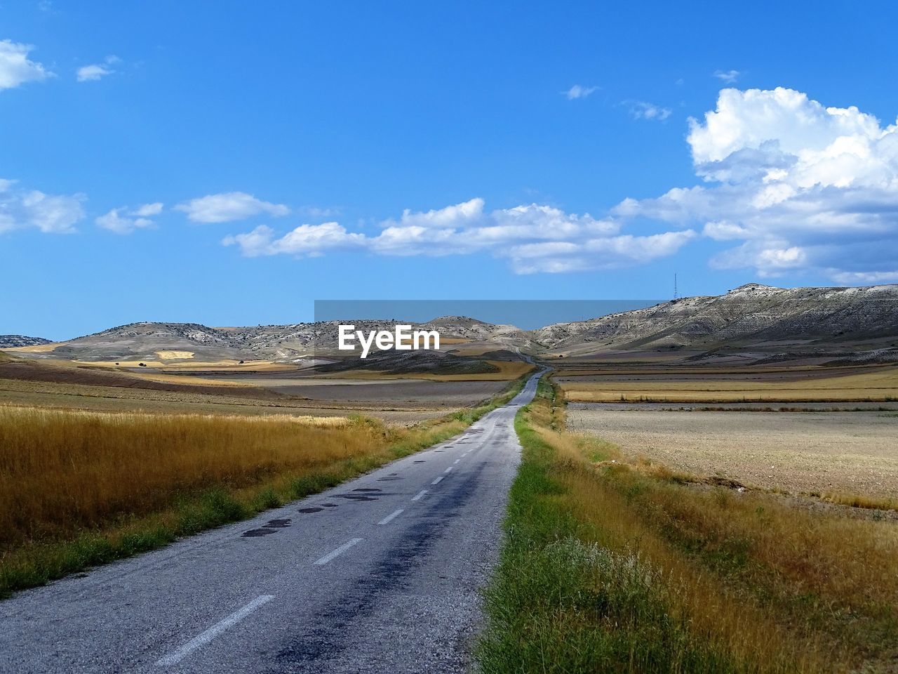 Road leading towards mountain