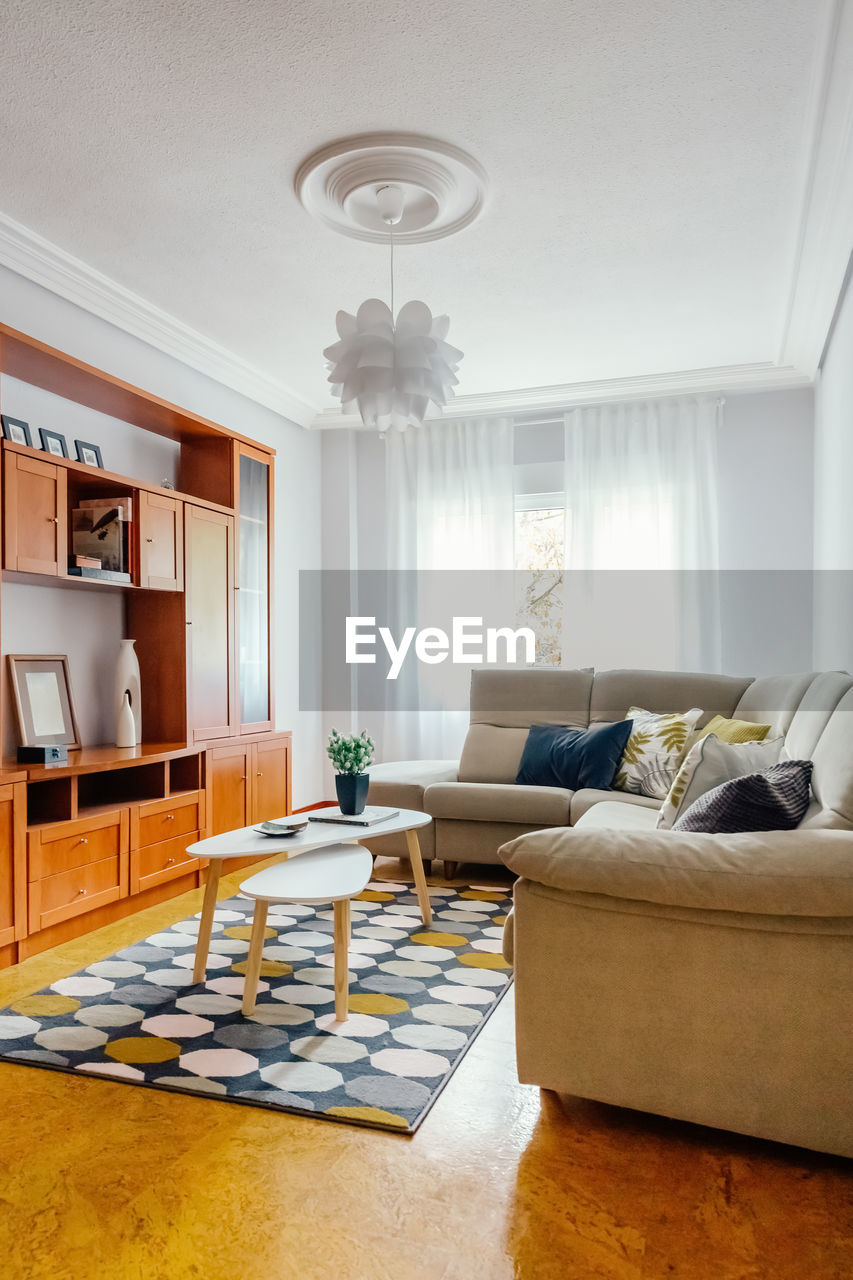 Interior of a living room decorated with corner sofa