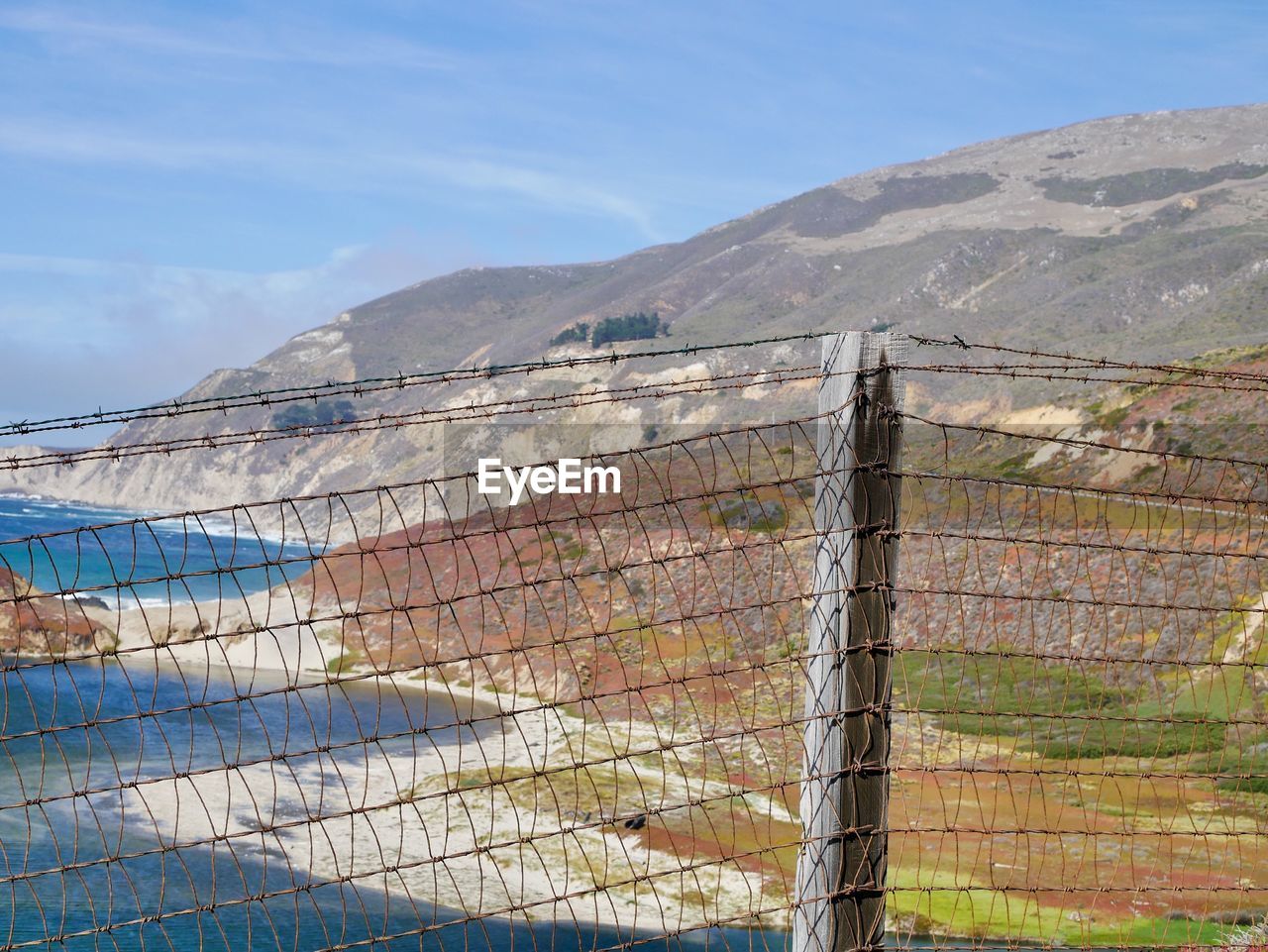 VIEW OF FENCE ON MOUNTAIN