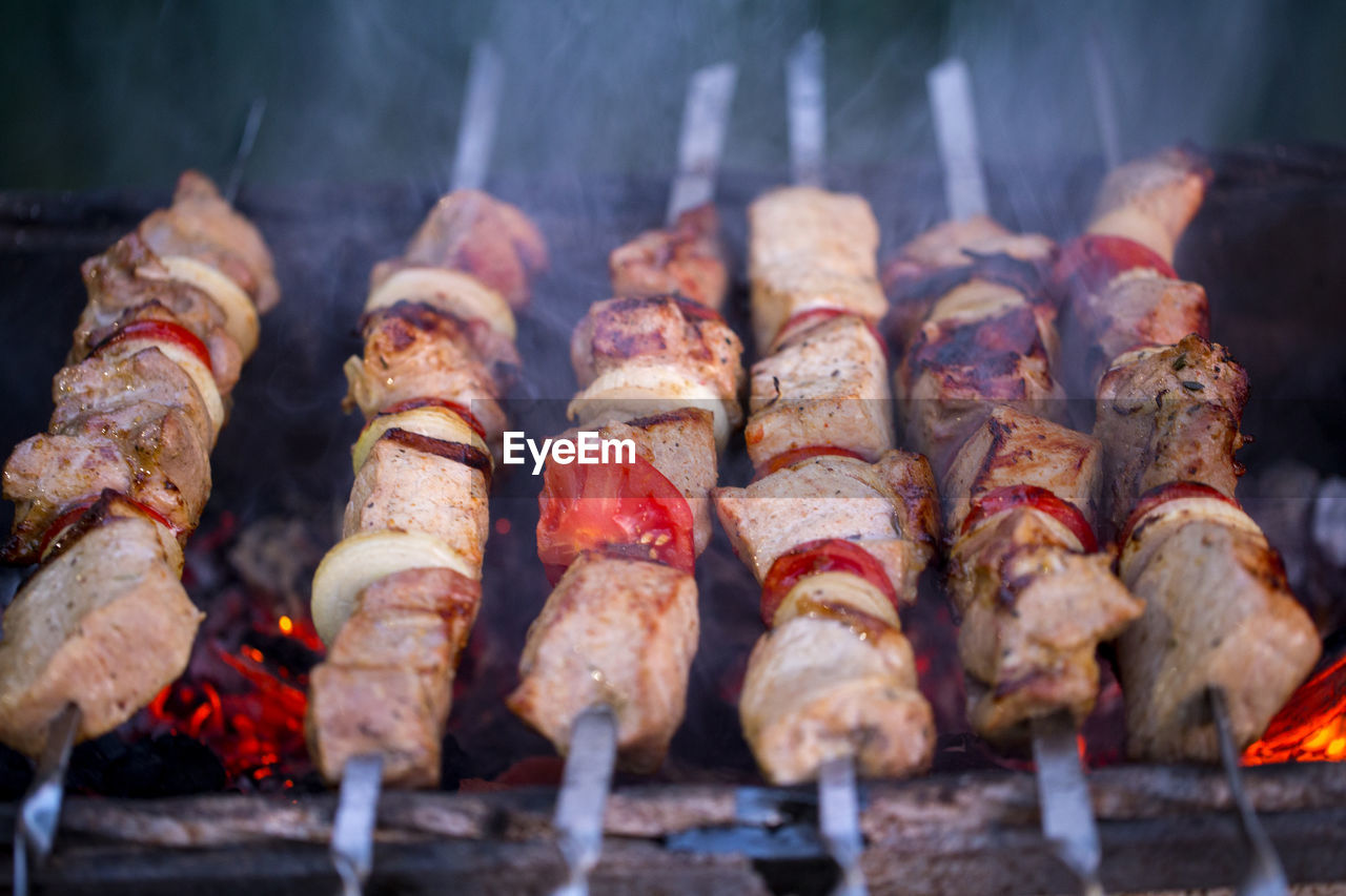 Close-up of meat grilling on barbecue