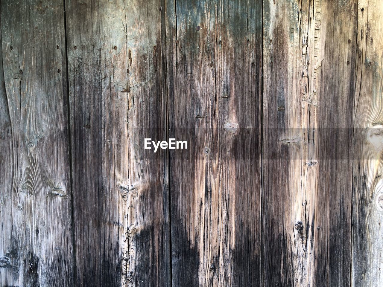 full frame shot of weathered wooden wall