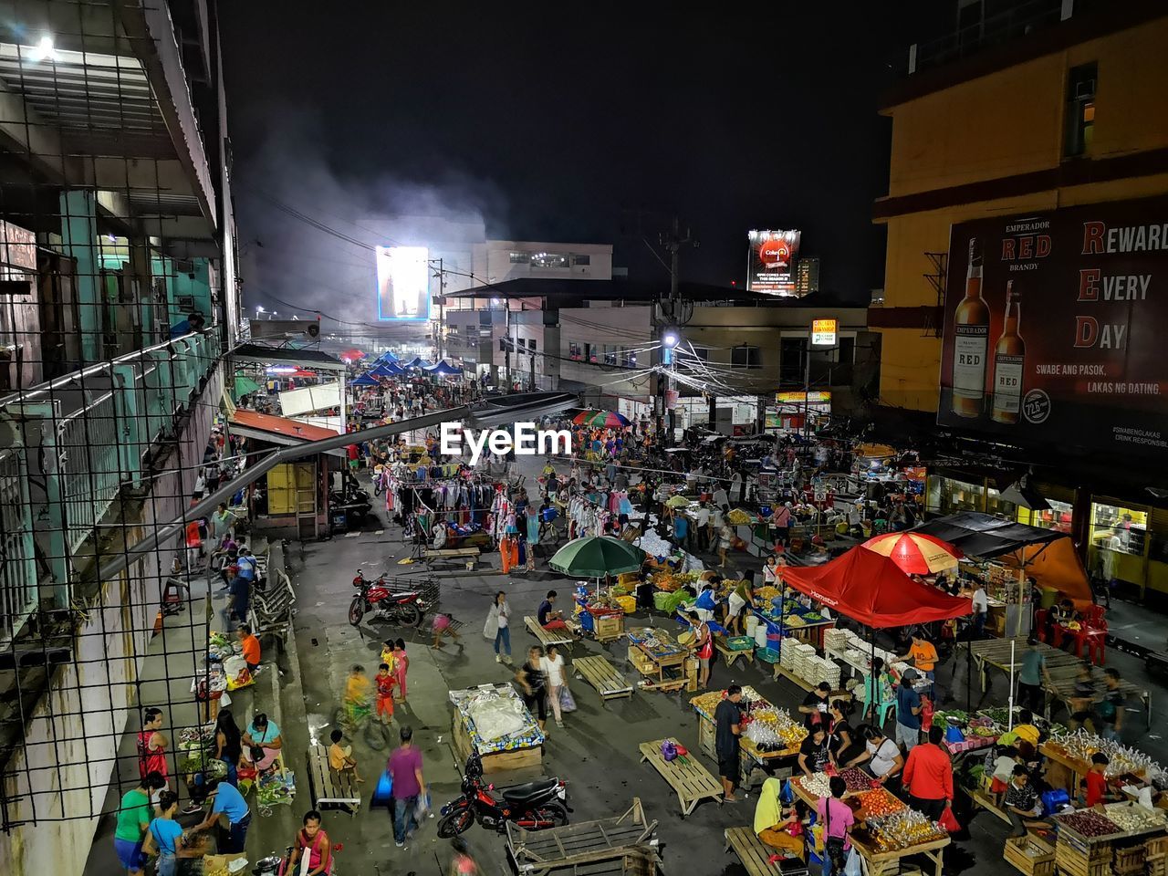 High angle view of people on street at night