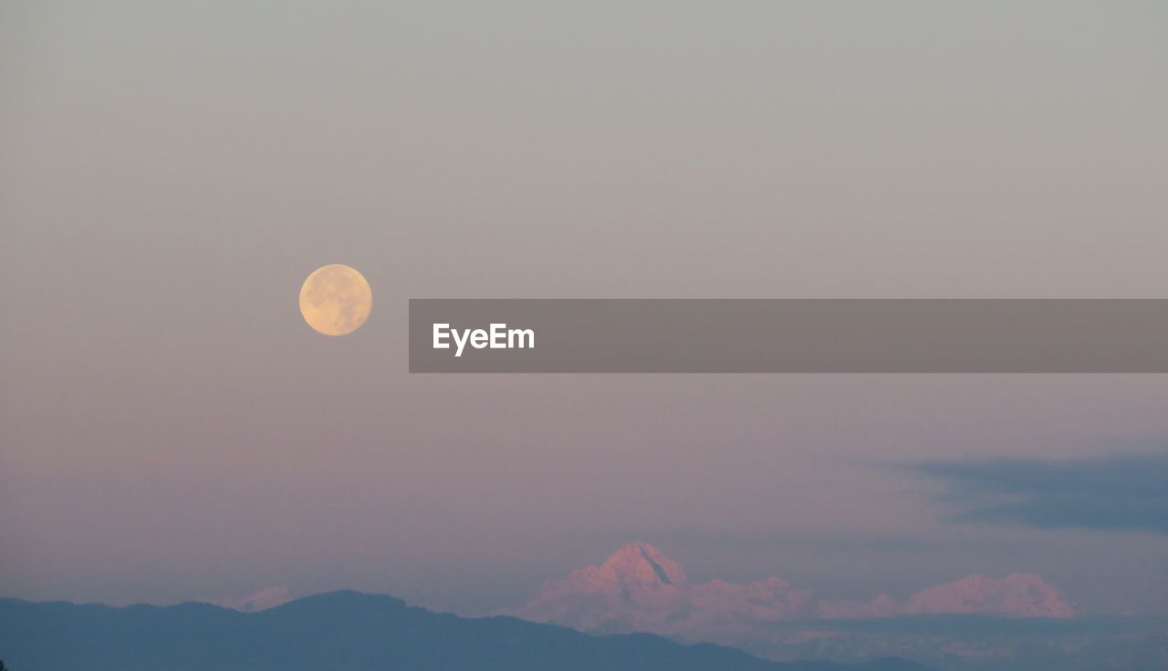 Scenic view of moon against sky at night