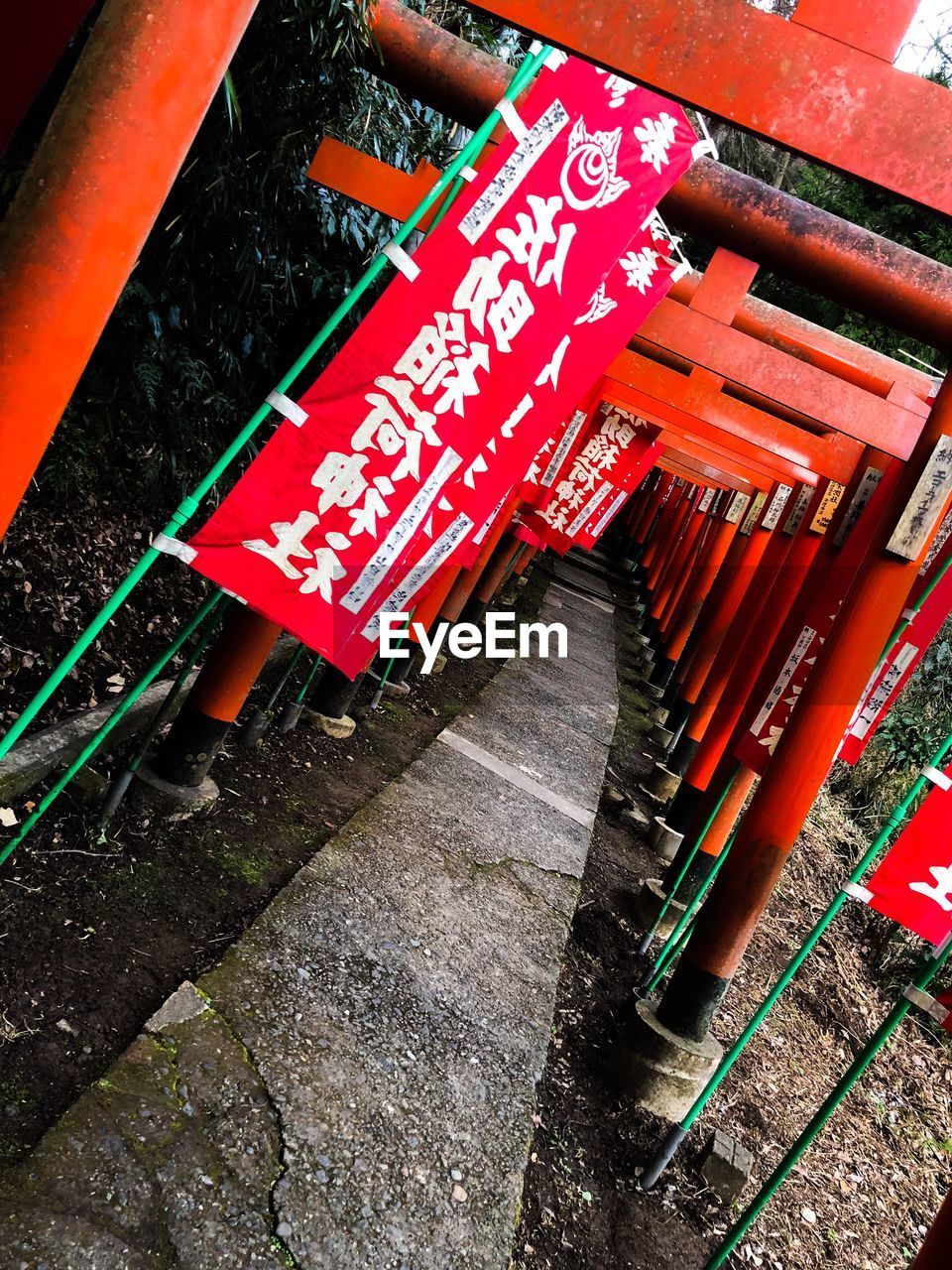 TEXT WRITTEN ON RED BUILDING