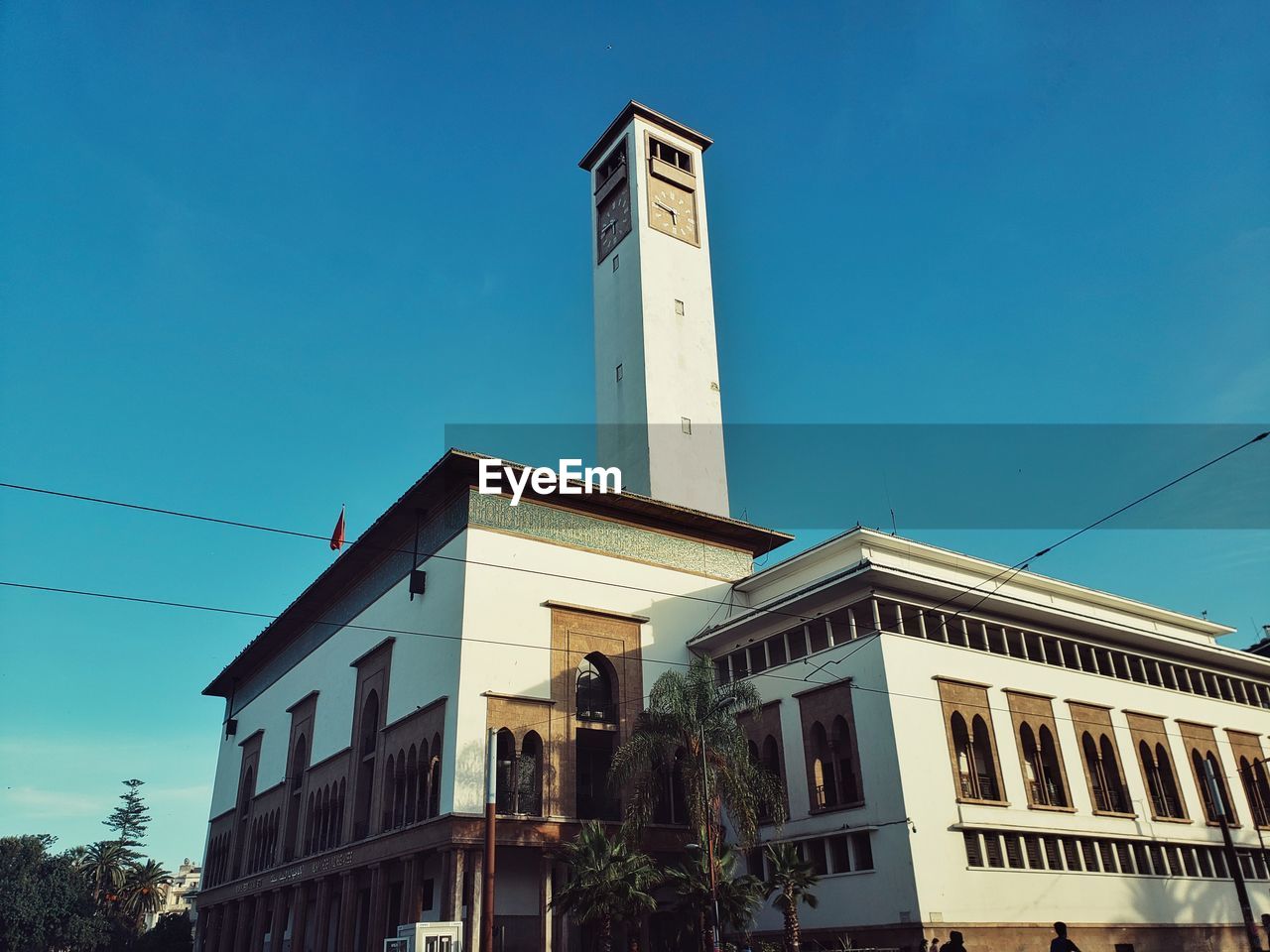 LOW ANGLE VIEW OF BUILDINGS AGAINST CLEAR SKY