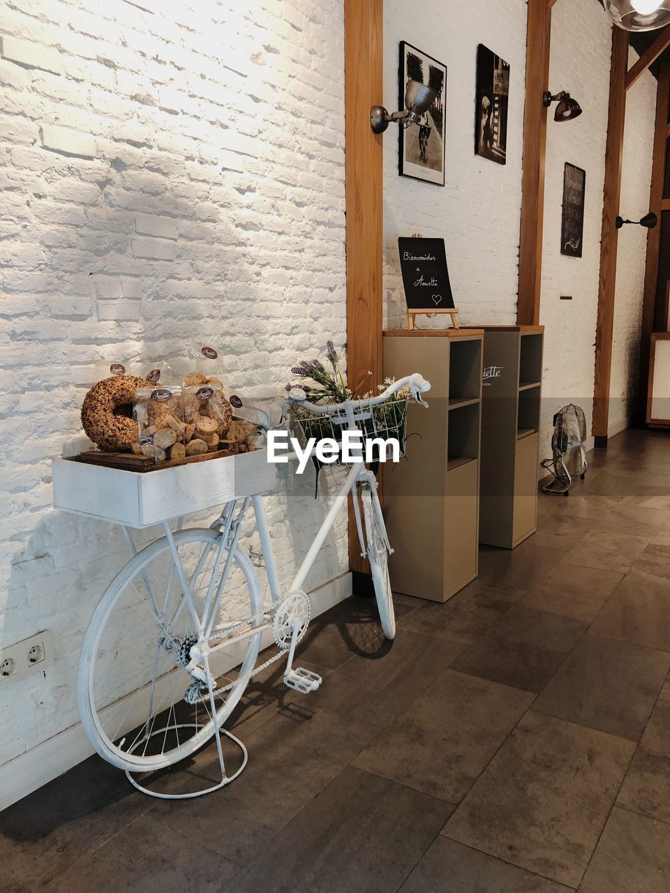 BICYCLES ON TABLE AGAINST BUILDING