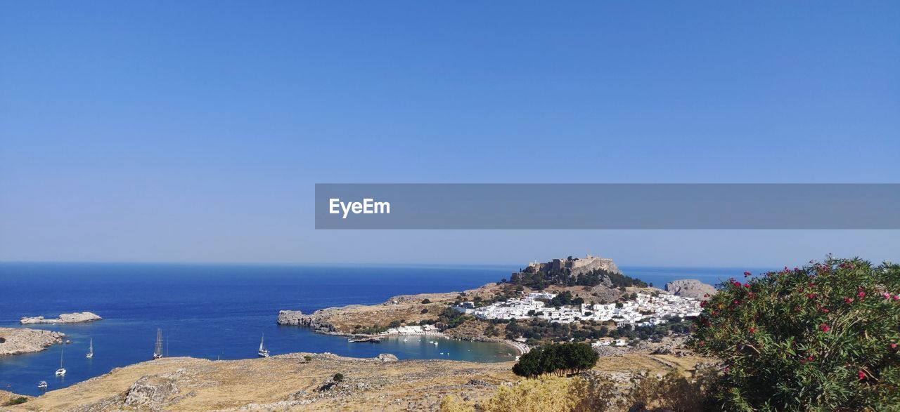 PANORAMIC VIEW OF SEA AGAINST CLEAR SKY