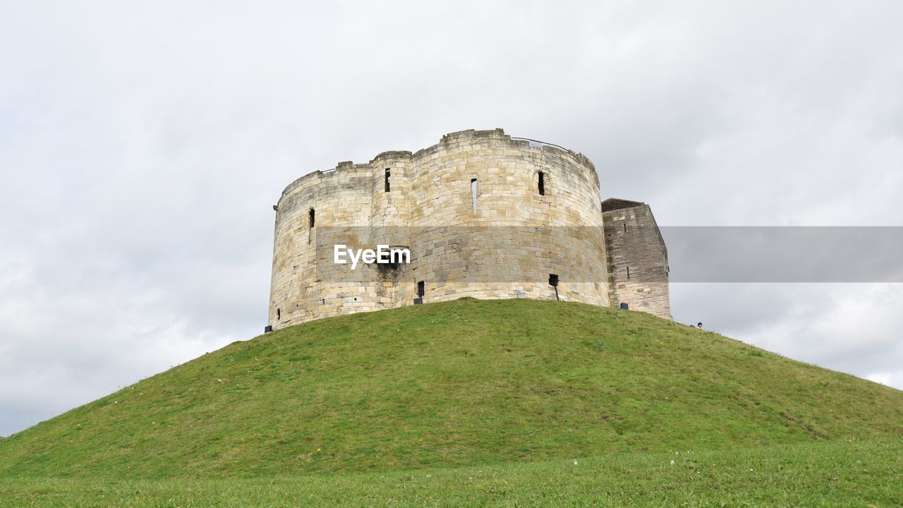 Low angle view of fort against sky