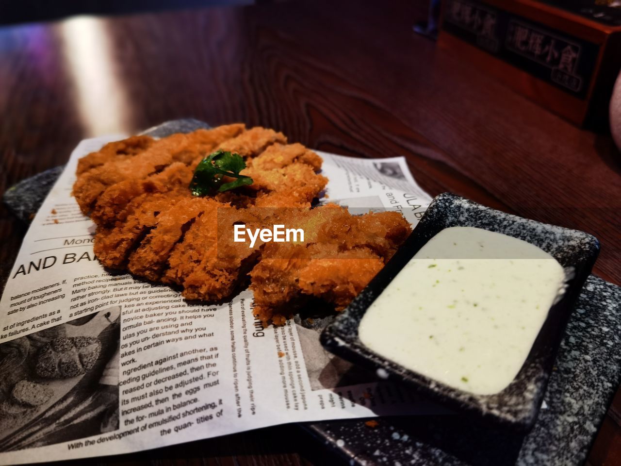 CLOSE-UP OF FOOD SERVED ON TABLE