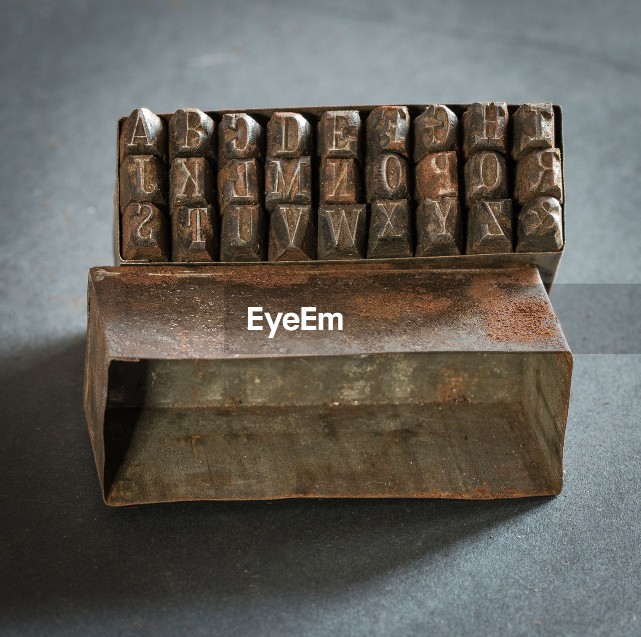 Close-up of rusty metal on table