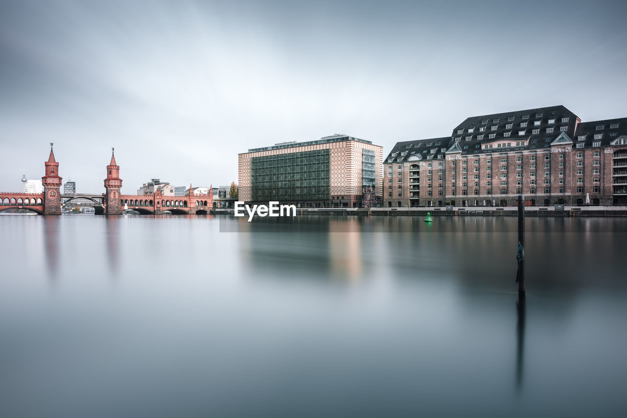 River with built structures in distance