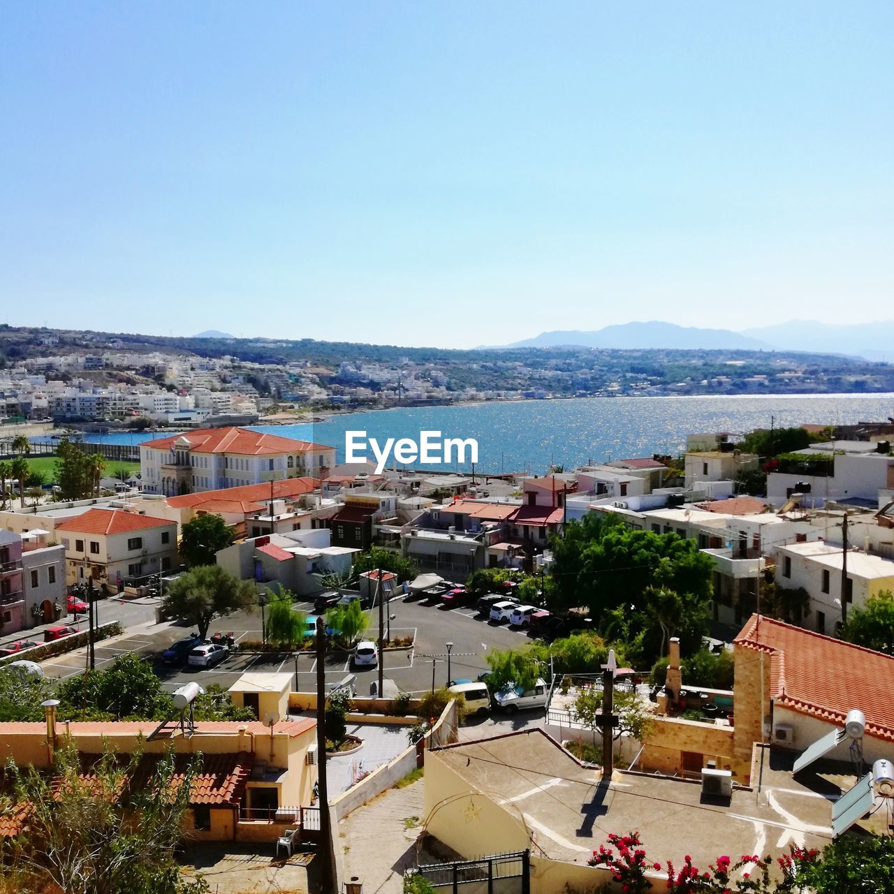 High angle view of townscape against blue sky