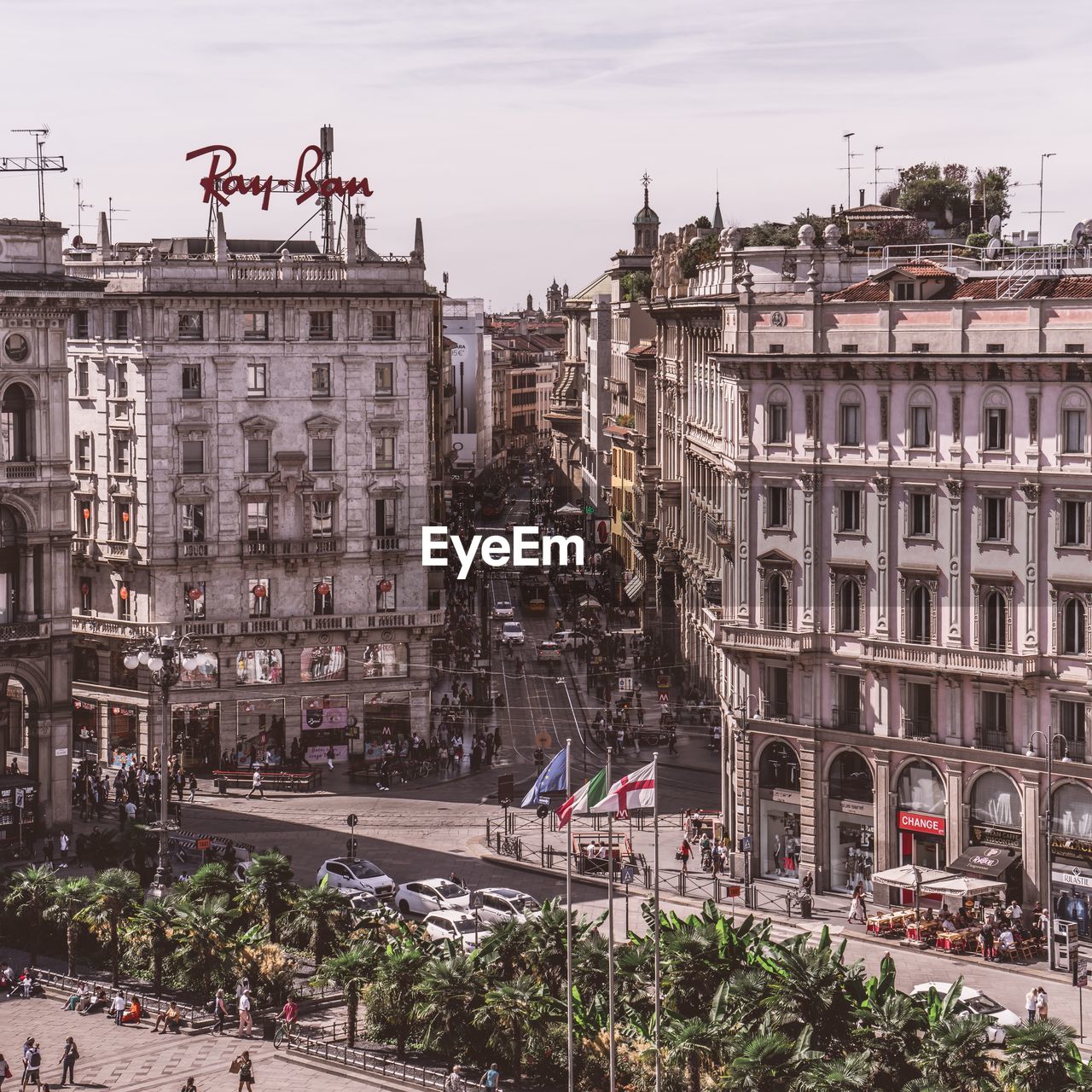 HIGH ANGLE VIEW OF PEOPLE ON STREET BY BUILDINGS IN CITY